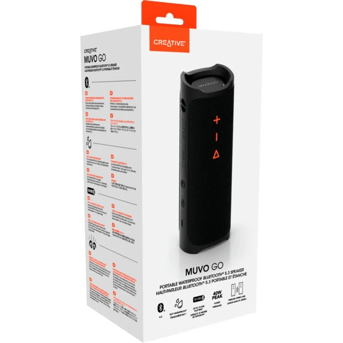 Pudełko z czarnym głośnikiem przenośnym, pomarańczowymi przyciskami.