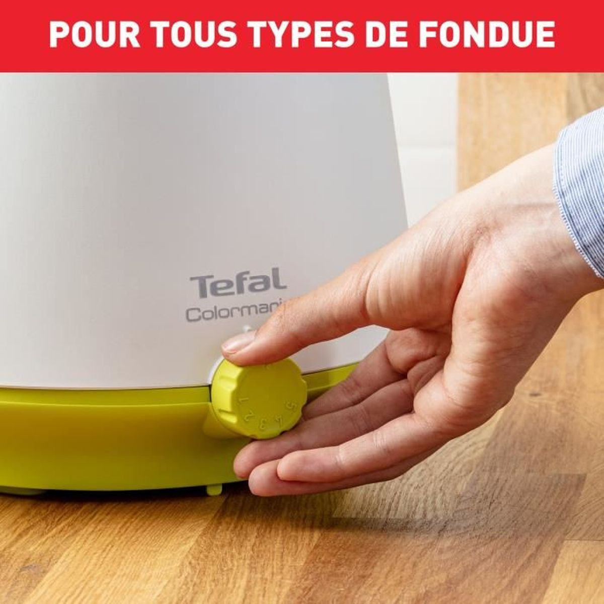 Hand dreht gelben Drehknopf an weiß-grünen Tefal Gerät. Roter Text oben.