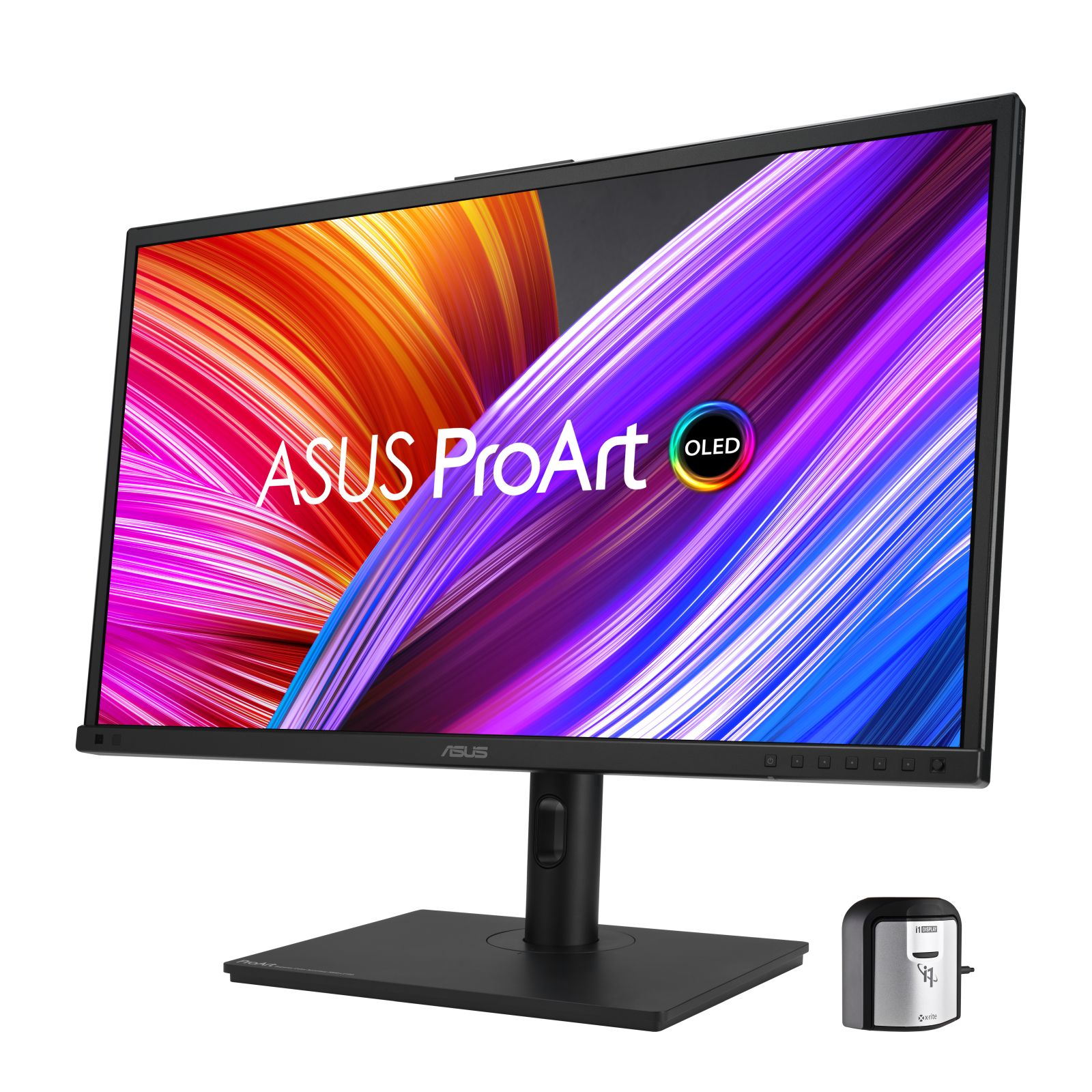 Monitor ASUS ProArt OLED, z małym urządzeniem obok.