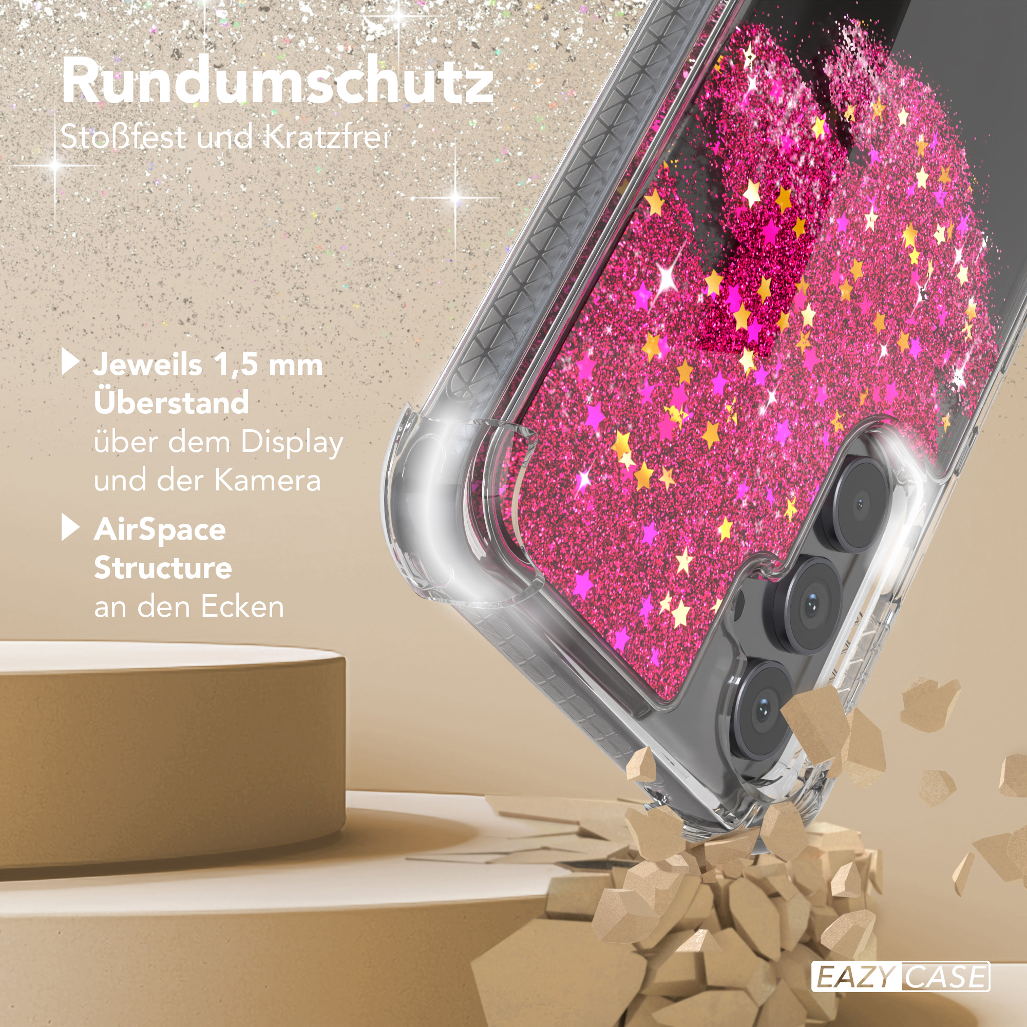 Nahaufnahme einer Handyhülle mit Glitzer und Sternen, mit zerbrochener Oberfläche darunter.