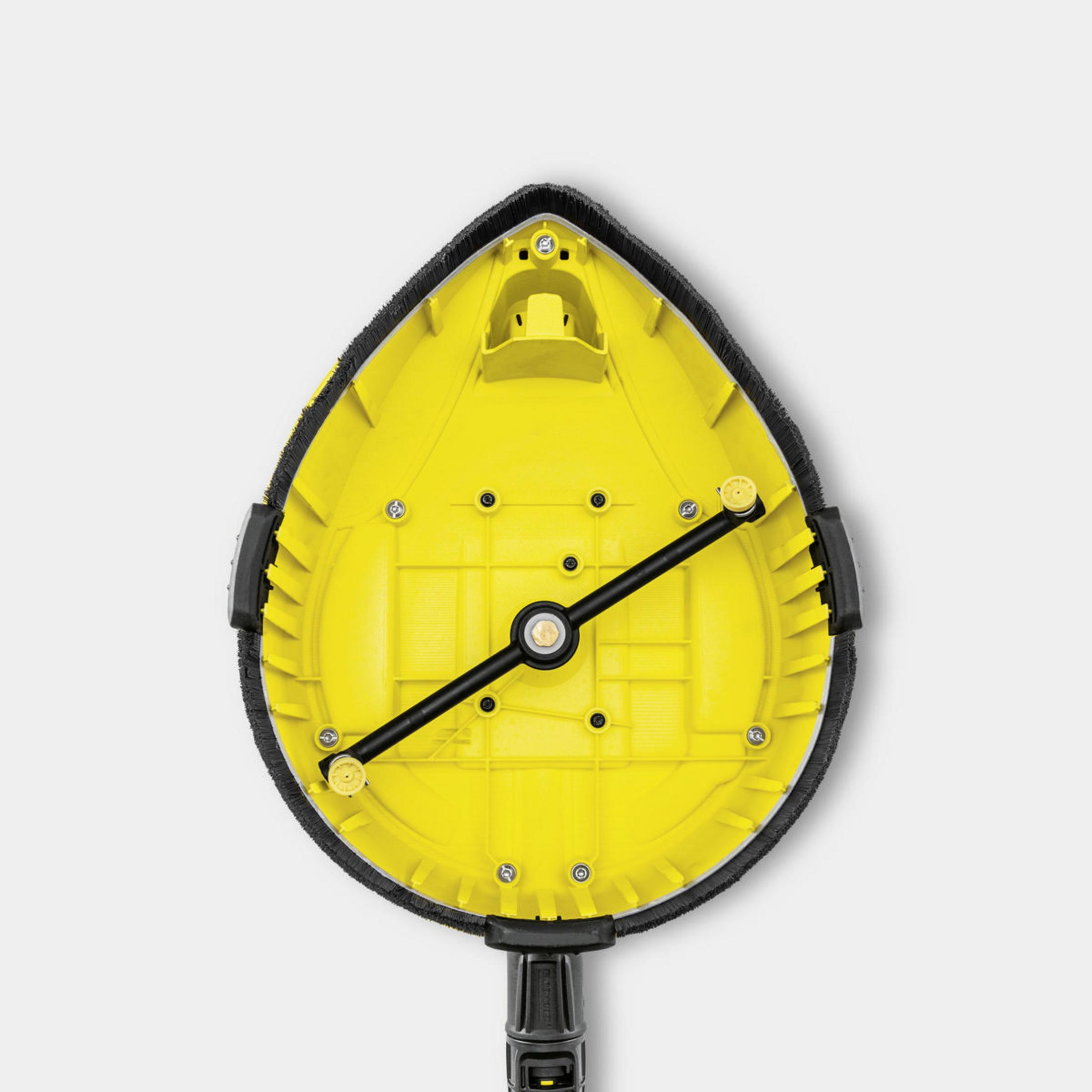 Żółto-czarna podstawa do czyszczenia powierzchni Kärcher, widok od dołu, na białym tle.