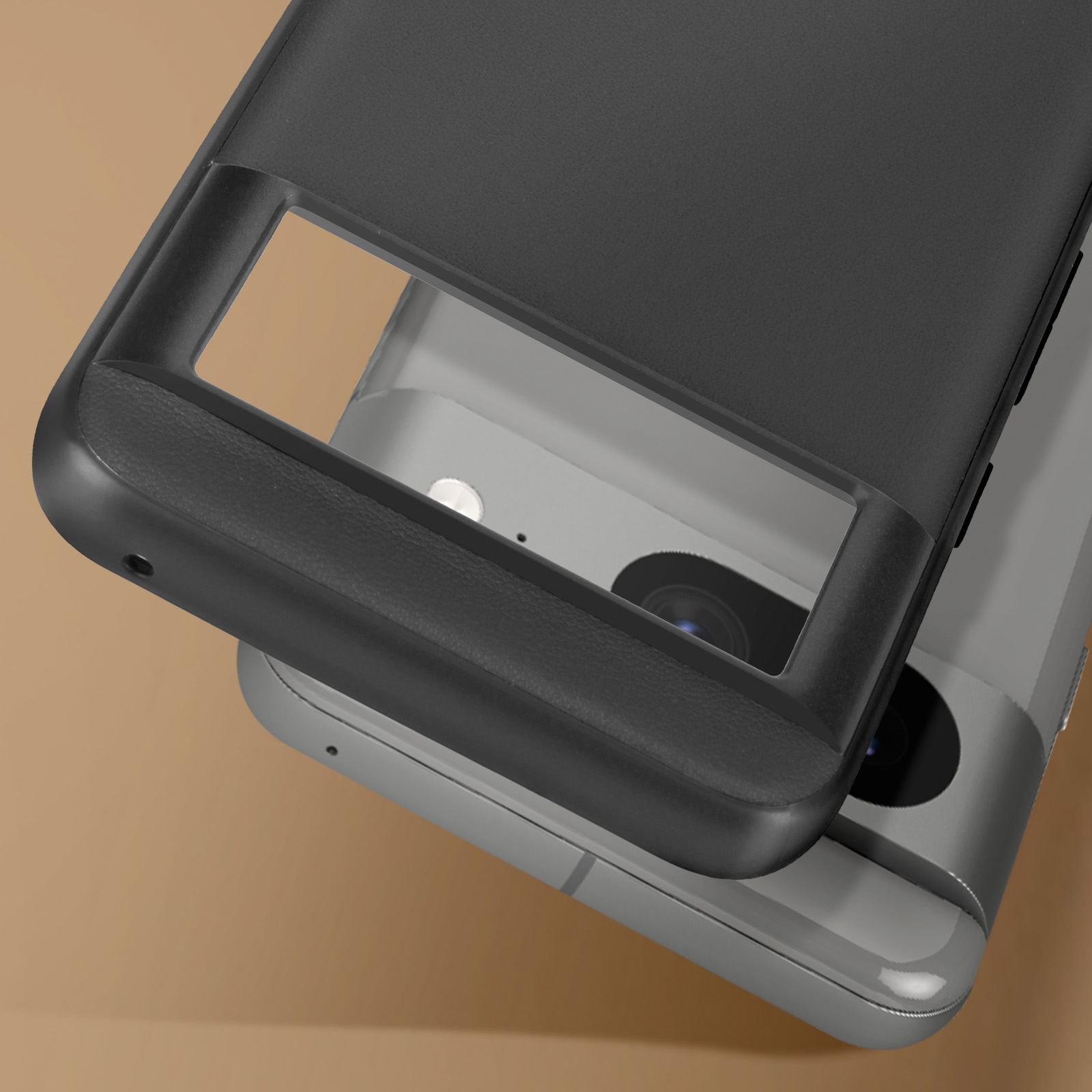 Custodia nera per telefono su un telefono argento con sfondo beige.