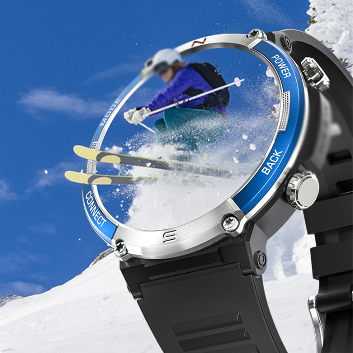Eine Smartwatch zeigt einen Skifahrer in der Luft, mit Schnee und Himmel im Hintergrund und blauem Rahmen.
