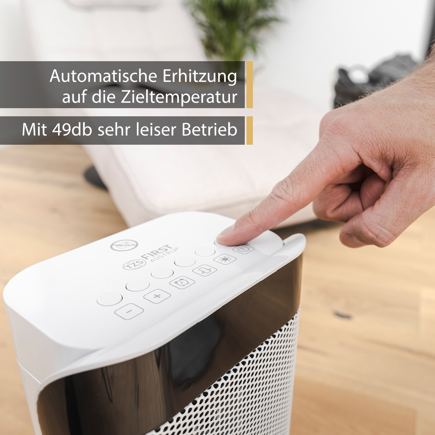 Una persona preme un pulsante su un riscaldatore bianco. Il testo indica riscaldamento automatico e funzionamento silenzioso.