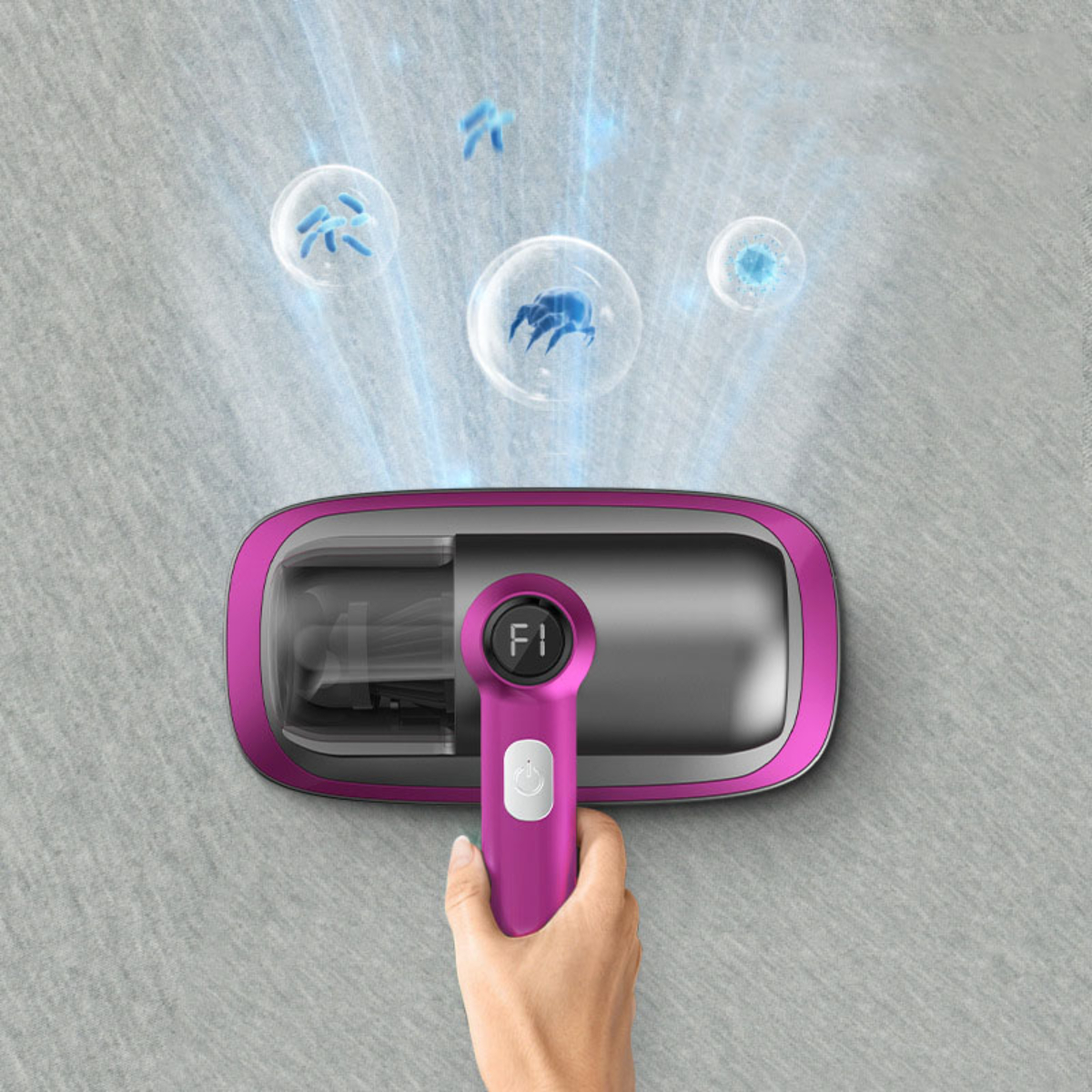 Ein magenta Handstaubsauger reinigt Stoff, mit blauen Blasen, die Bakterien darstellen.