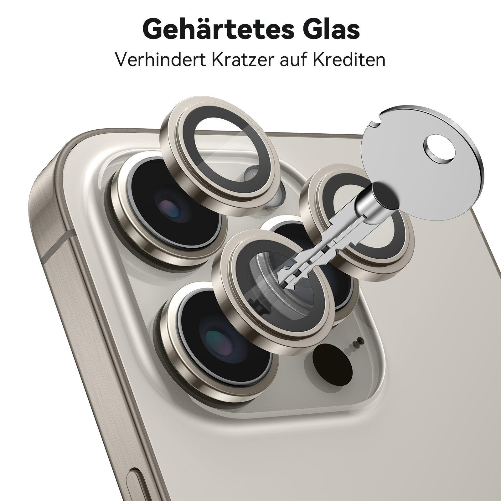 Telefonkameralinsen mit Abdeckungen und einem Schlüssel. Hintergrund ist ein Telefongehäuse.