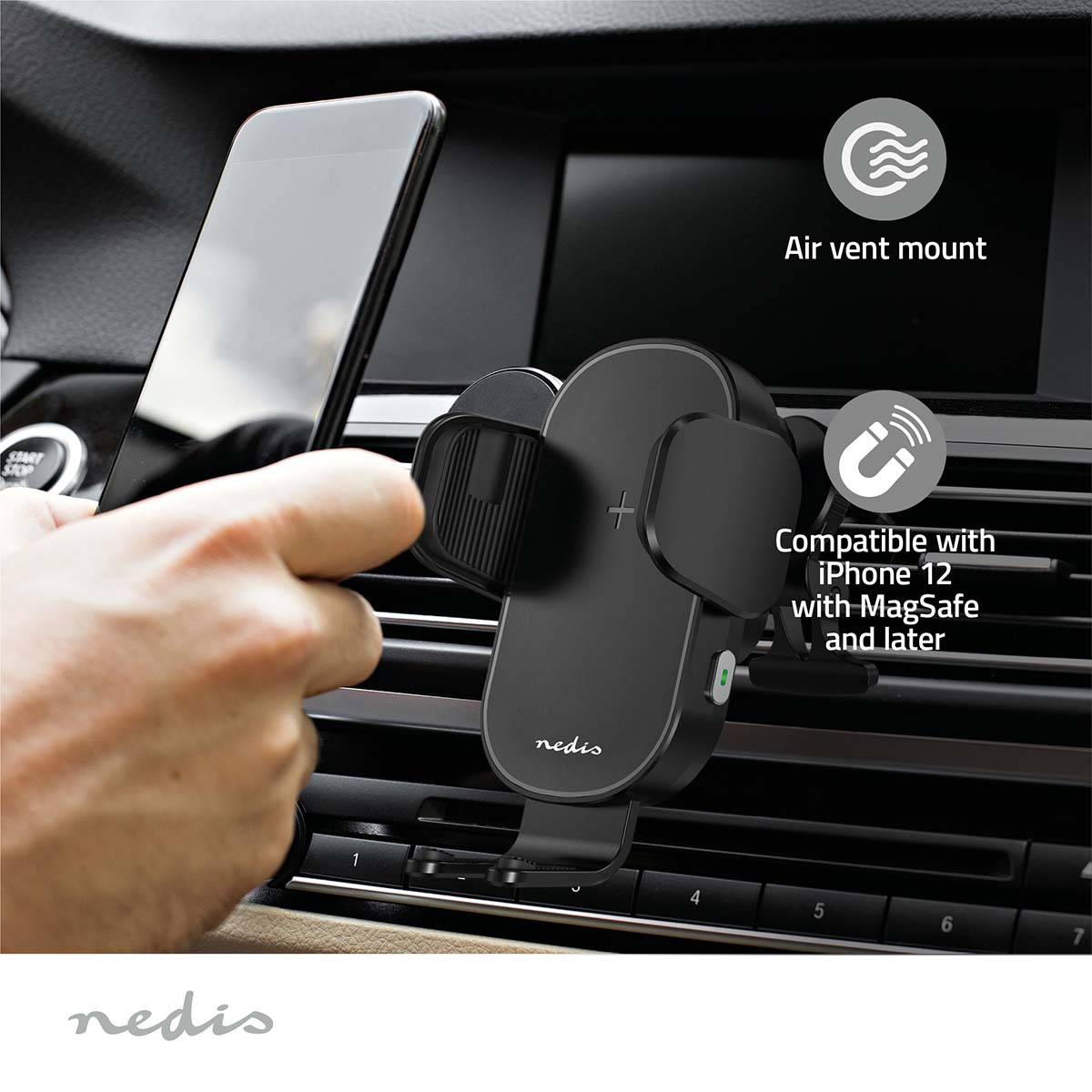 A car interior with a phone mounted on a black holder.