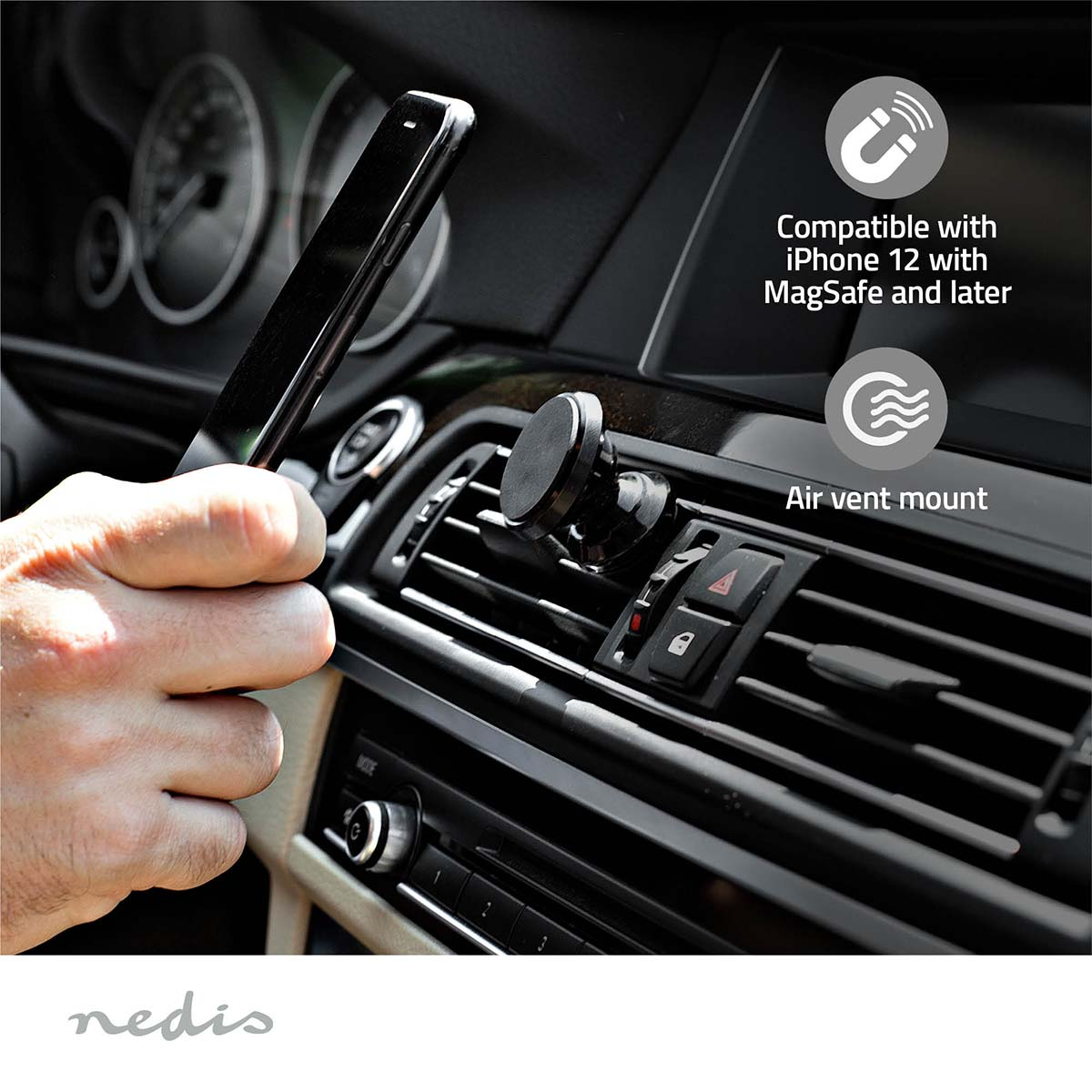 Hand, die ein Telefon in der Nähe einer Lüftungsöffnung hält, mit magnetischer Halterung.