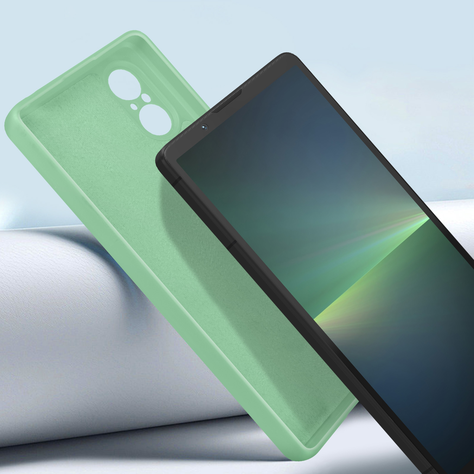 Una custodia per telefono verde e un tablet nero. La custodia è di lato. Il tablet ha una cornice nera.