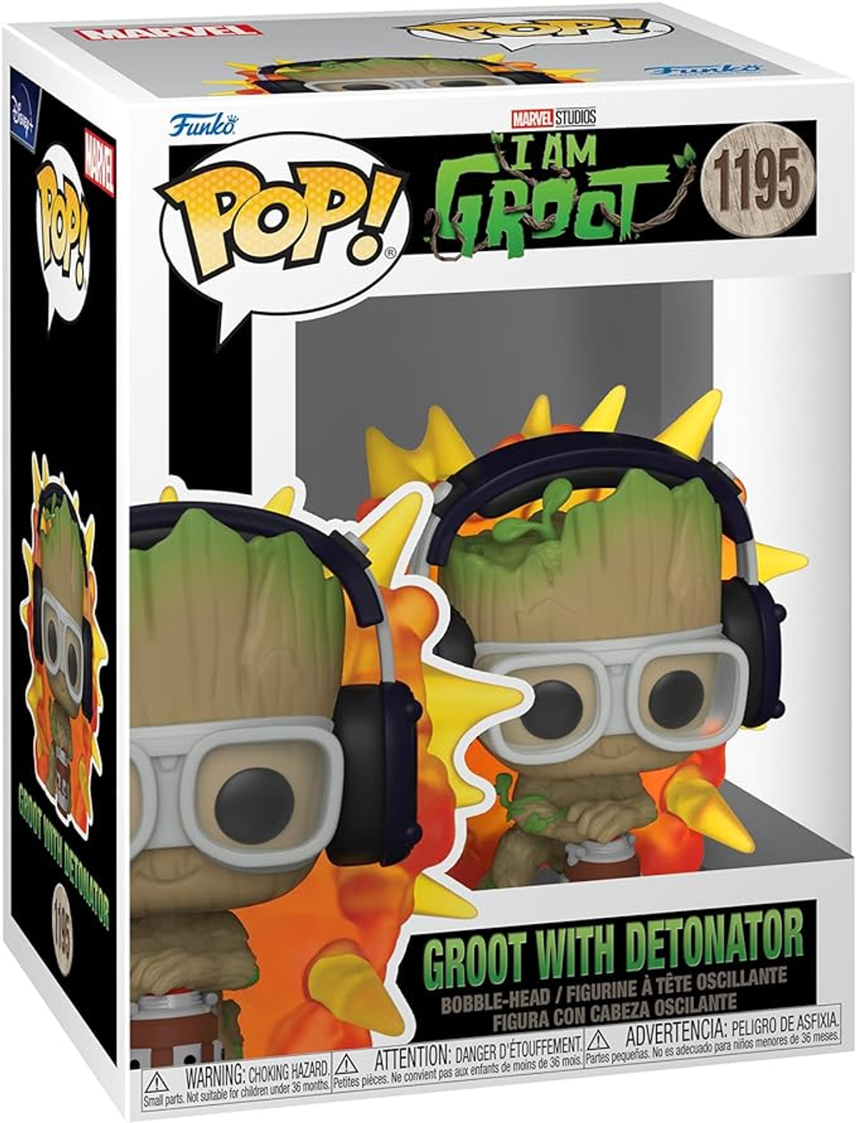 Una scatola Funko Pop con IO SONO GROOT con le cuffie. La scatola è su una superficie bianca. Groot è in posa.
