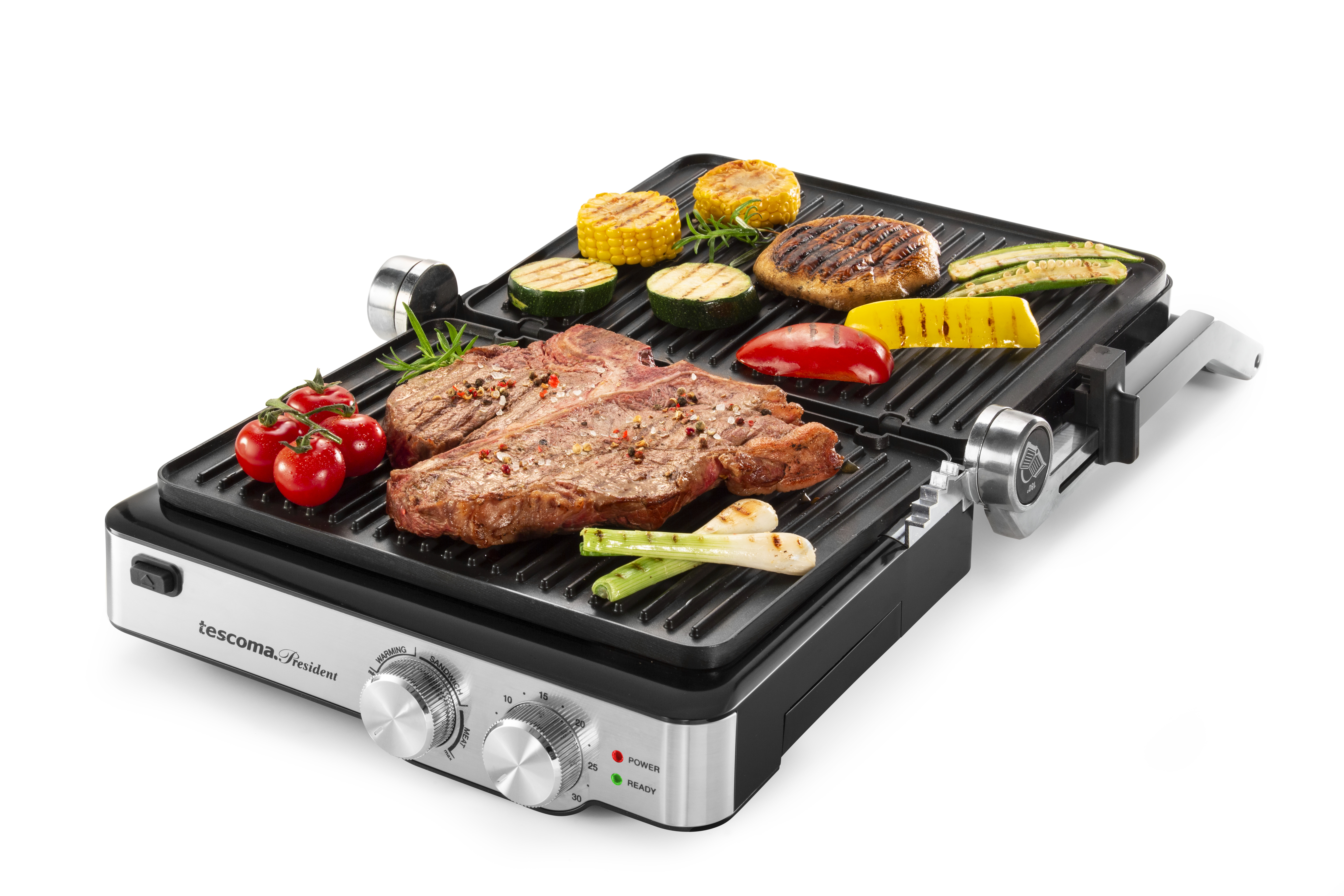Elektrischer Grill mit gegrilltem Steak, Gemüse und Mais auf weißem Hintergrund.