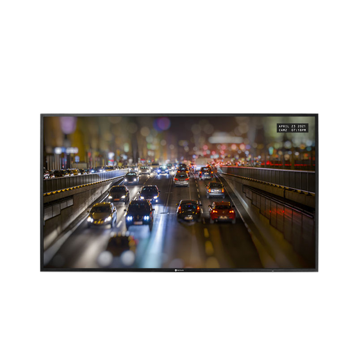 Nachtansicht einer Autobahn mit vielen Autos. Lichter von Gebäuden und Autos beleuchten die Szene. Datums- und Zeitstempel in der oberen rechten Ecke.