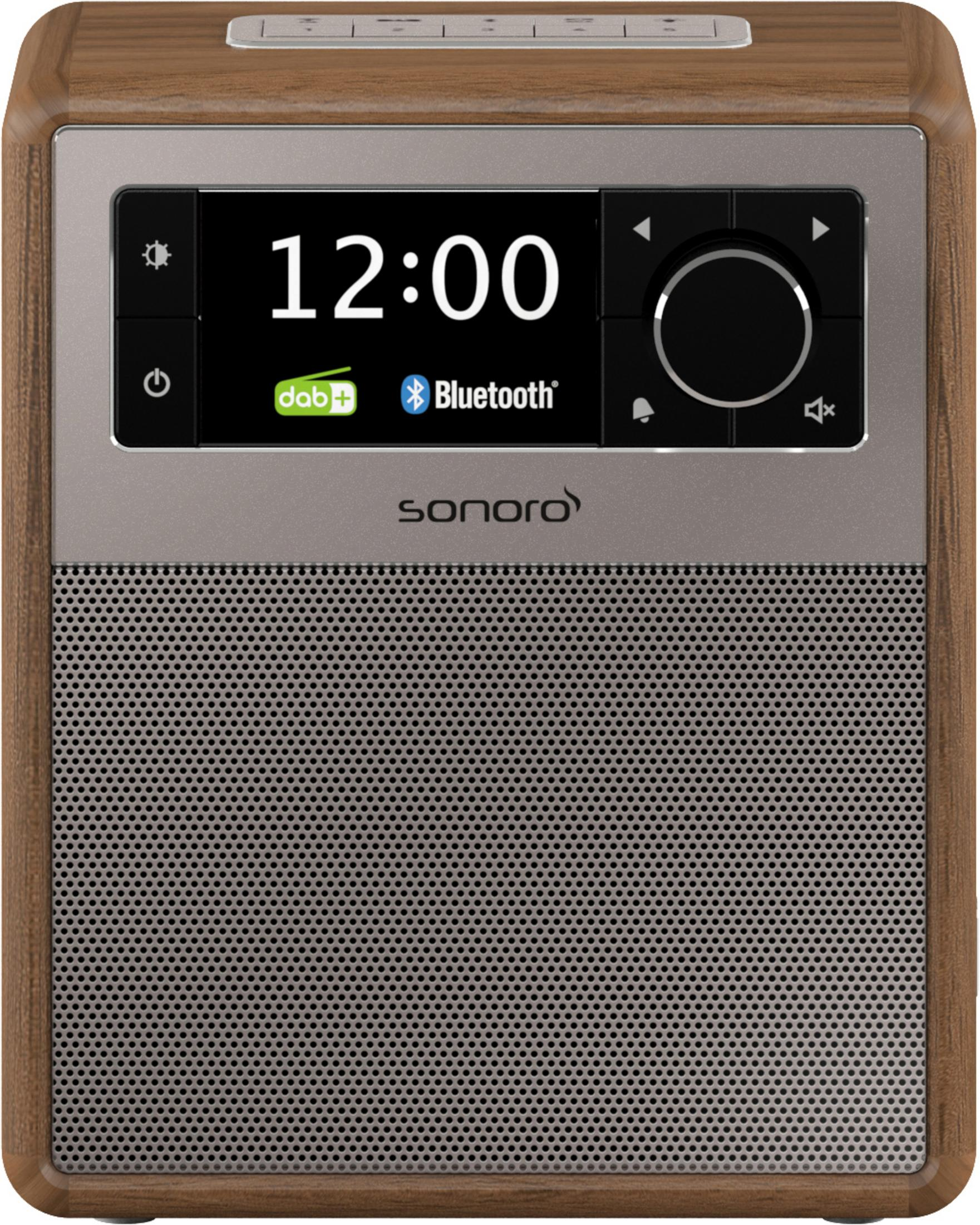 Holzradio mit silbernem Bildschirm, zeigt die Uhrzeit 12:00 sowie Bluetooth- und DAB+-Logos. Marke: Sonoro.