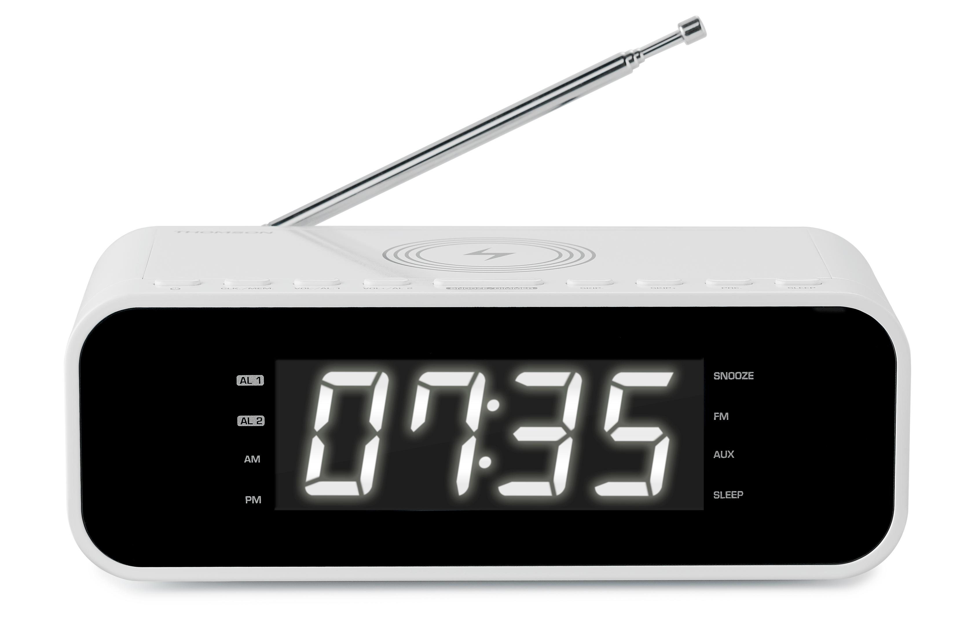 Biały cyfrowy budzik z wyświetlaczem pokazującym godzinę i anteną radiową.