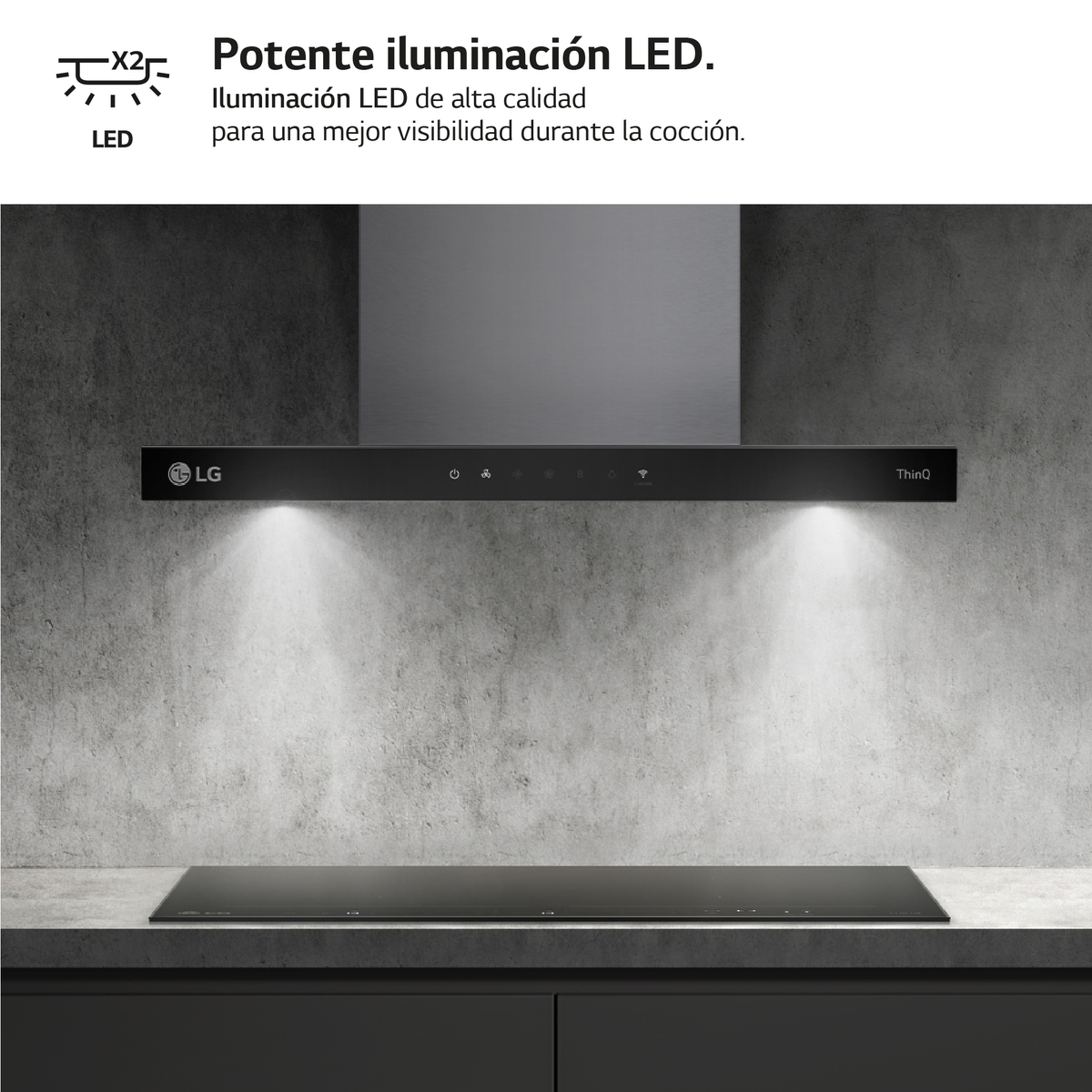 Campana extractora negra con luces LED iluminando una encimera. El logo de LG es visible.