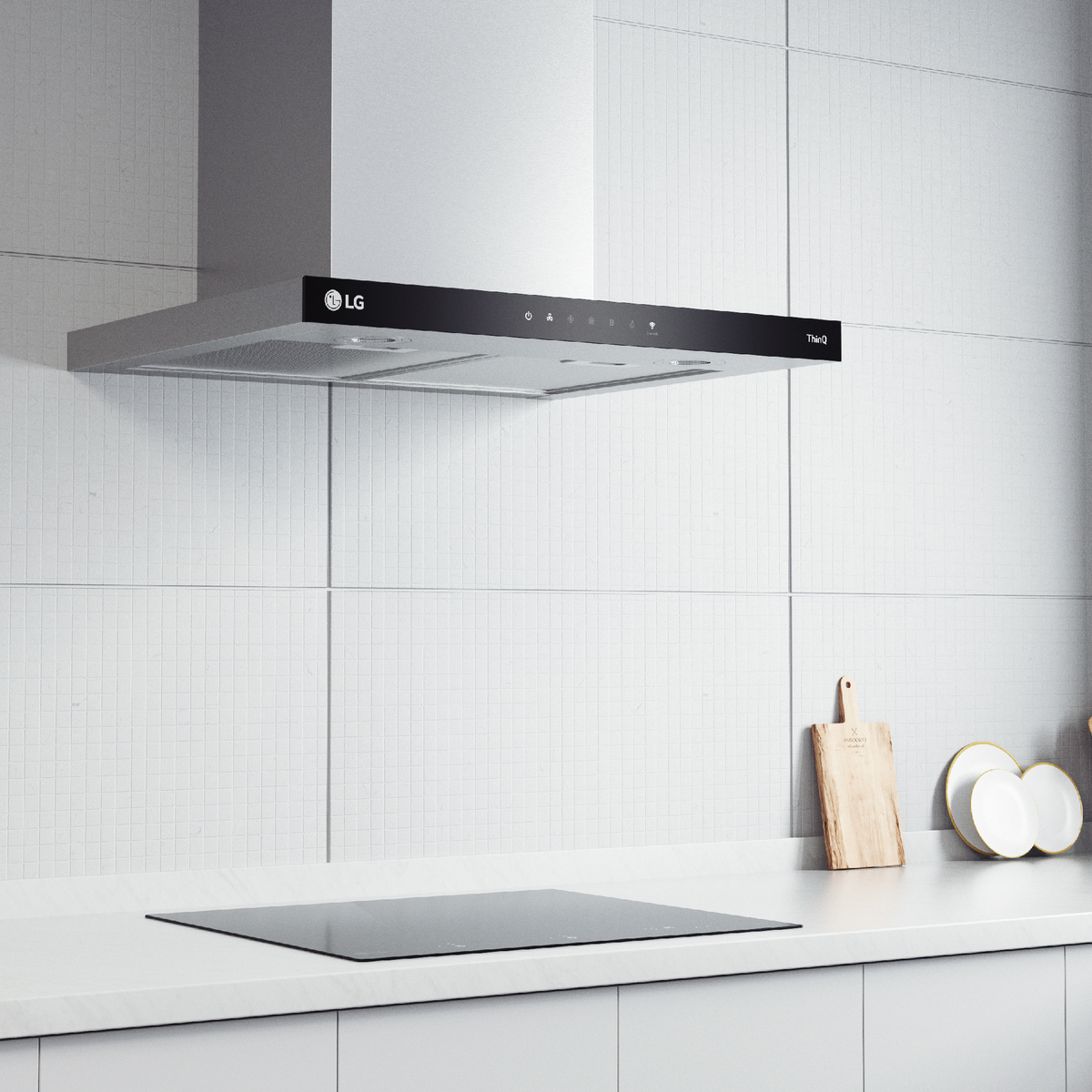 Cocina moderna con campana extractora y vitrocerámica de acero inoxidable.