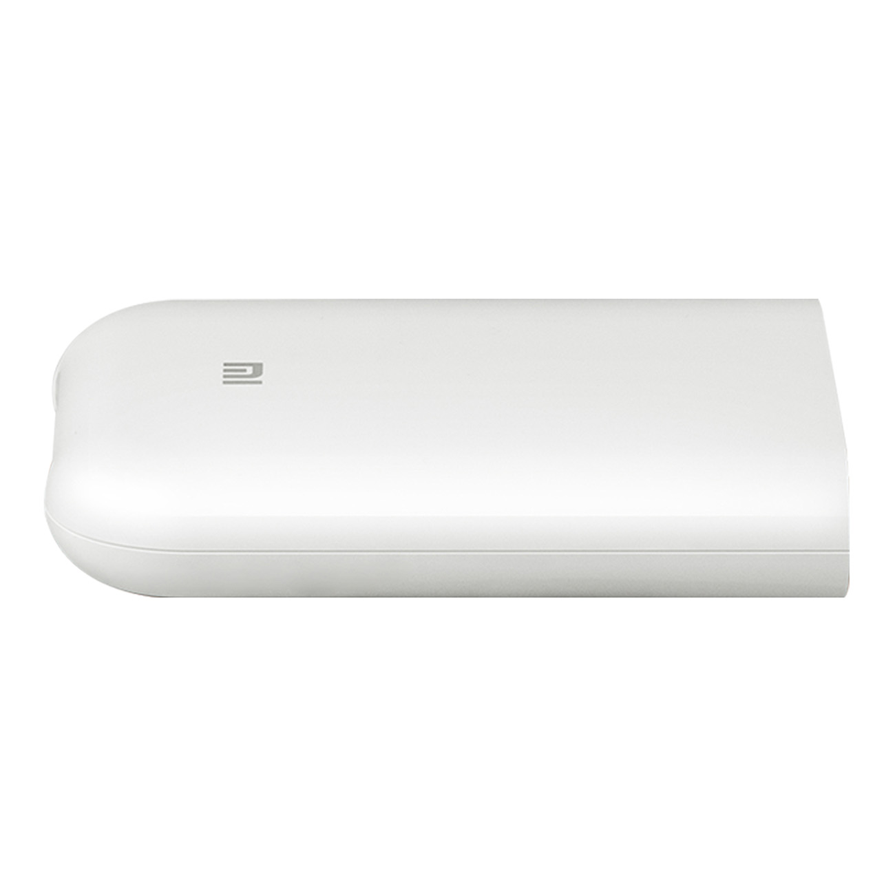 Białe prostokątne urządzenie ze środkowym logo. Zaokrąglone krawędzie. Białe tło.