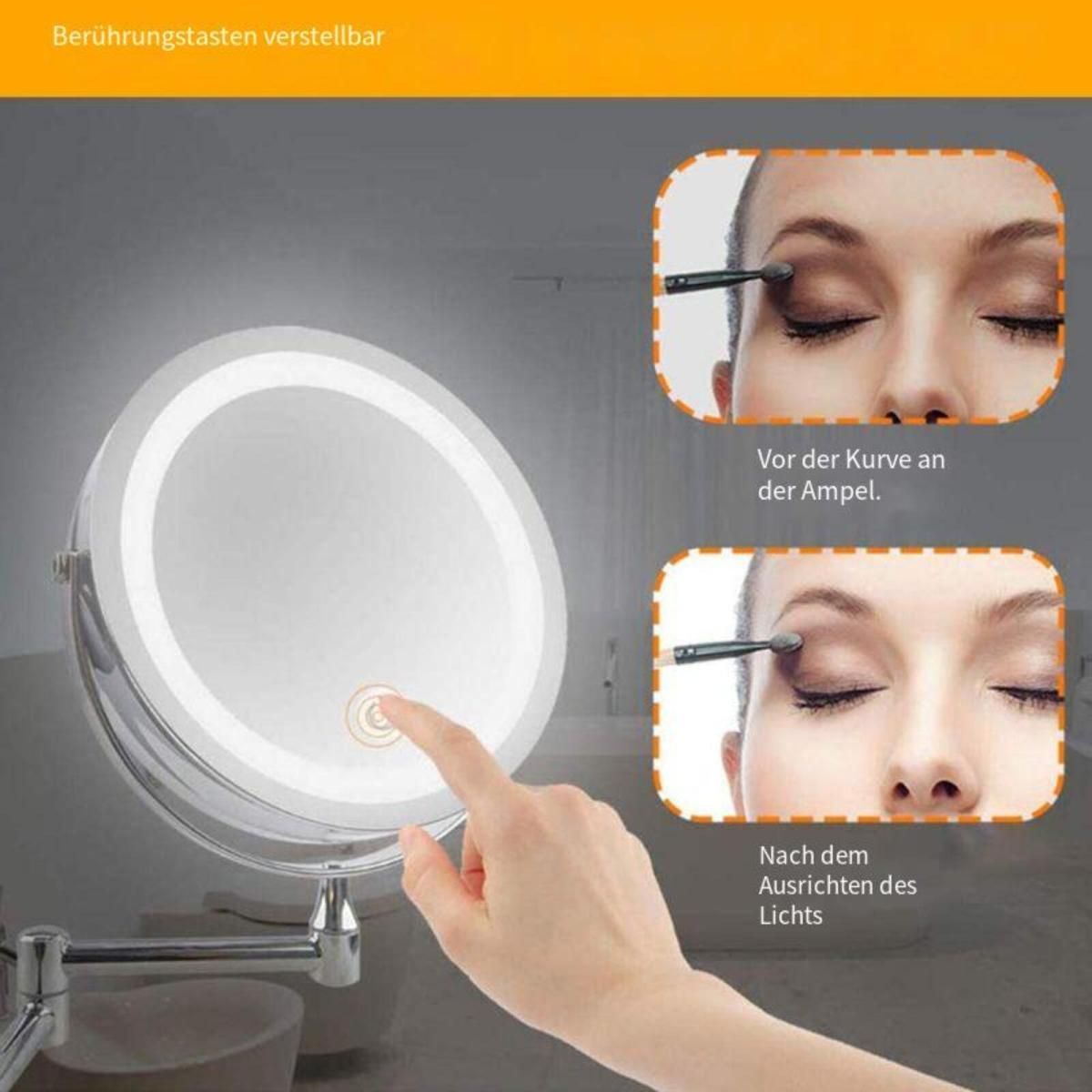 Eine Hand berührt einen beleuchteten, runden Spiegel mit zwei kleineren Bildern von Augen-Make-up.