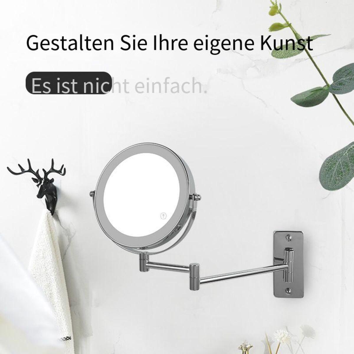 Ein wandmontierter, beleuchteter Spiegel und ein Hirschkopfhaken mit einem Handtuch.