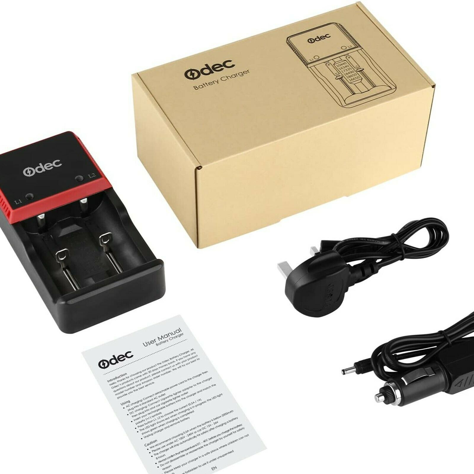 Schwarzes Batterieladegerät mit Netzkabeln, einer Box und einer Bedienungsanleitung.