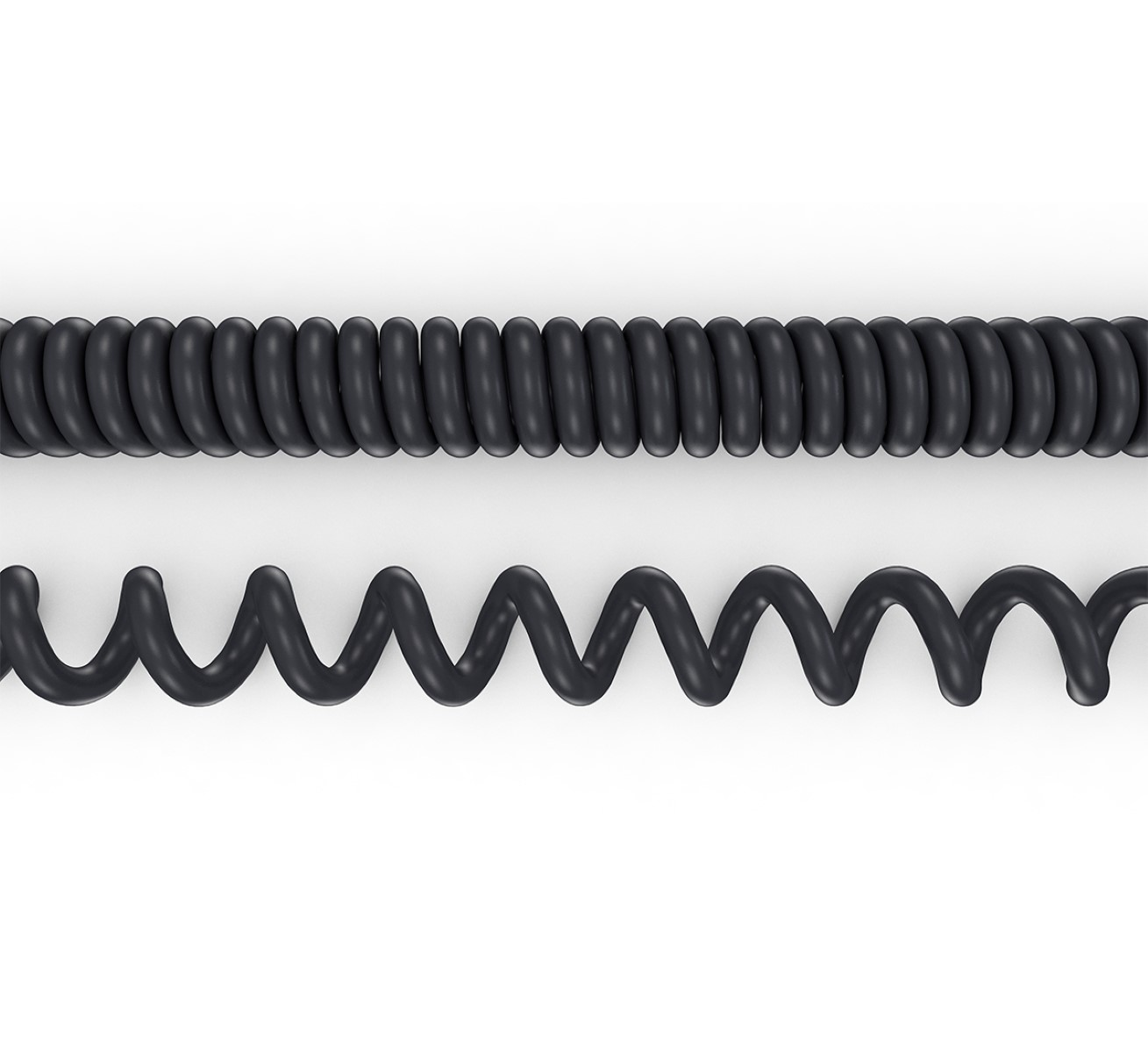 Zwei schwarze Spiralkabel, eines eng gewickelt und eines lockerer gewickelt, auf Weiß.