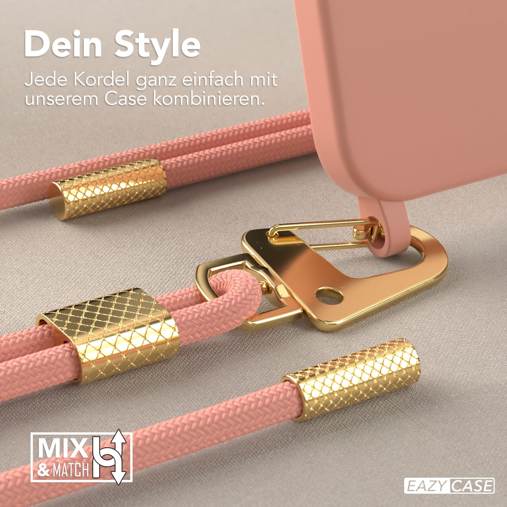 Eine Handyhülle mit rosa Kordel. Goldakzente und rosa Hintergrund. Der Text ist auf Deutsch.