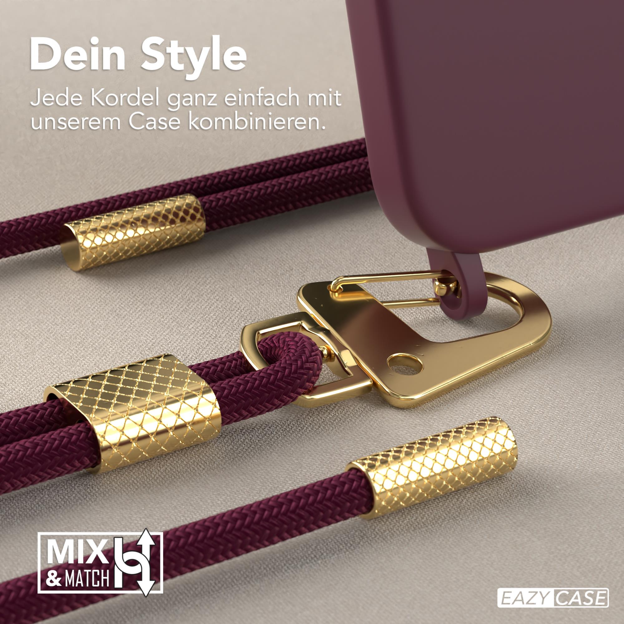 Nahaufnahme einer Handyhülle mit Lanyard. Die Hülle ist lila, mit goldenen Akzenten.