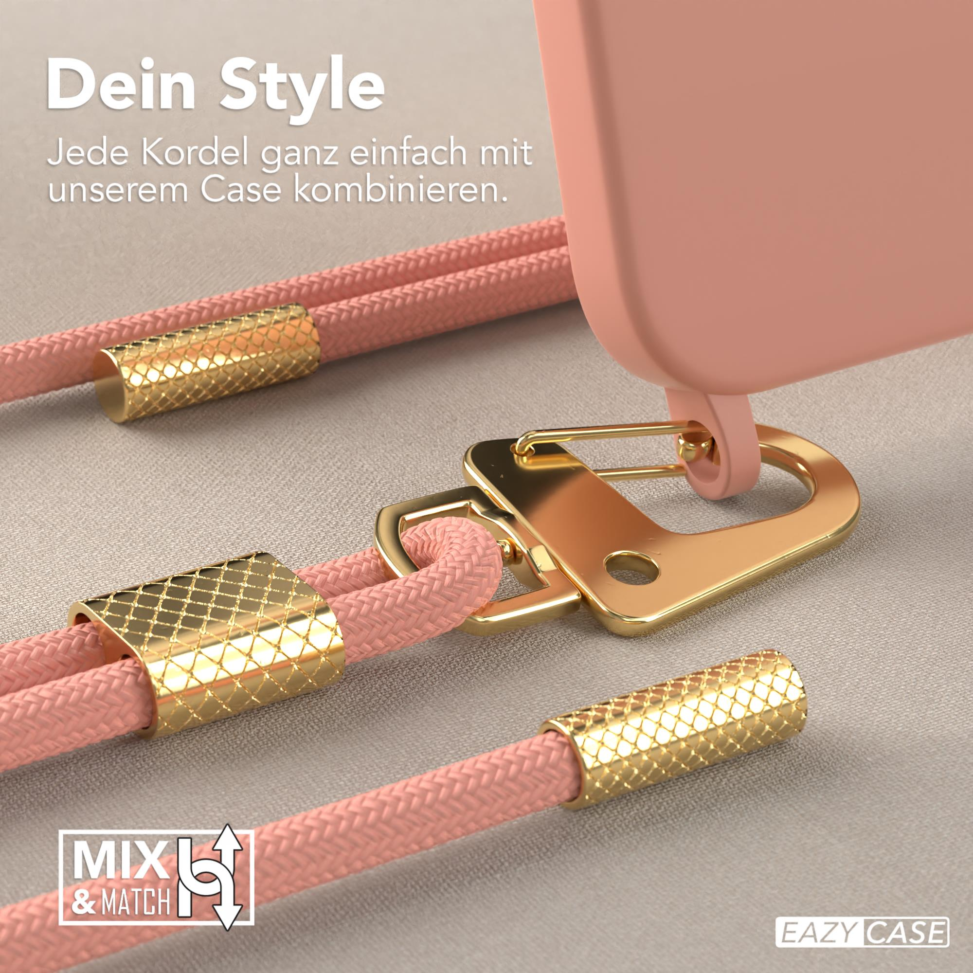 Nahaufnahme einer rosa Handyhülle mit goldener Kordel und Verschluss. Grauer Hintergrund.