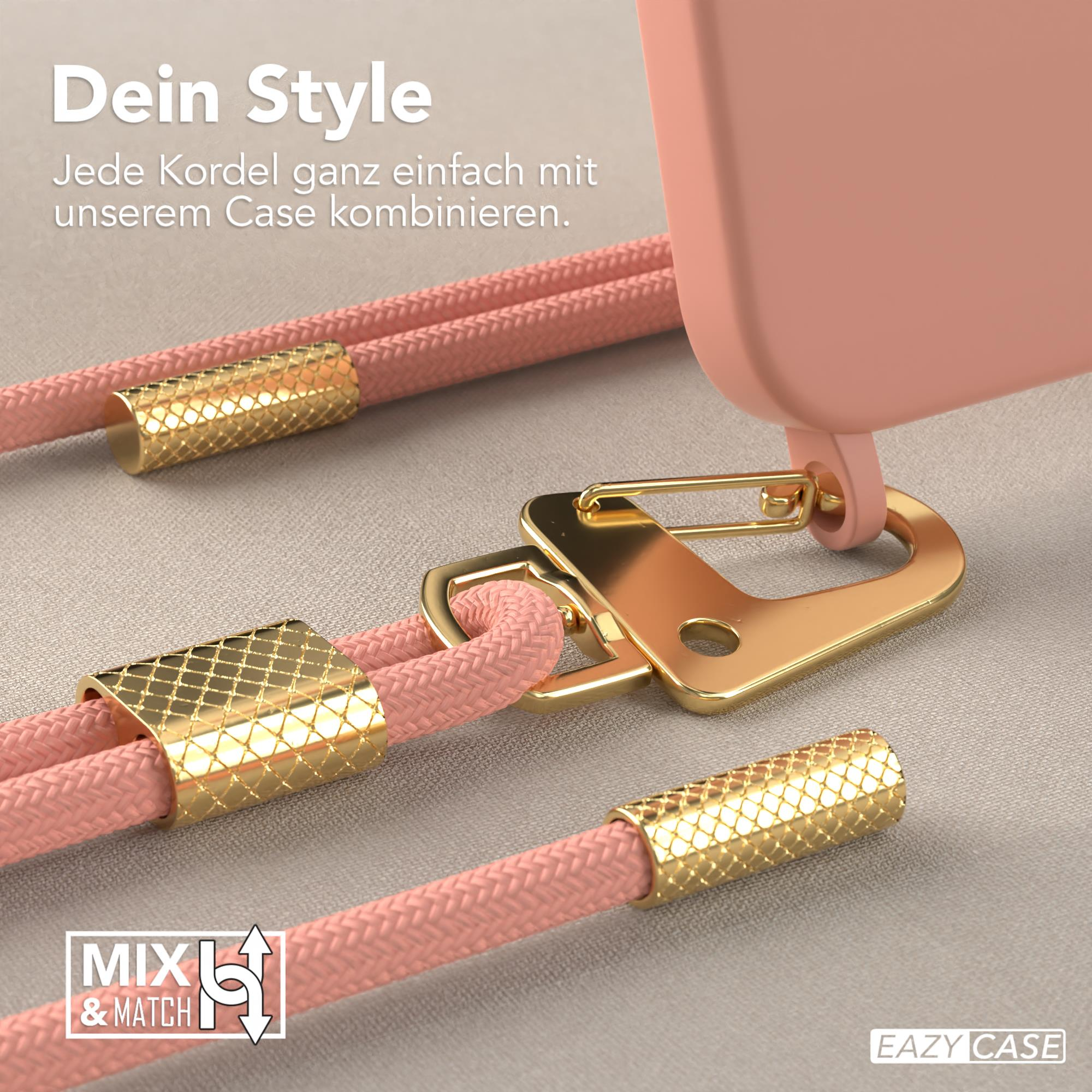 Nahaufnahme einer Handyhülle mit rosa Kordel und goldenen Akzenten. Text auf Deutsch sichtbar. Grauer Hintergrund.
