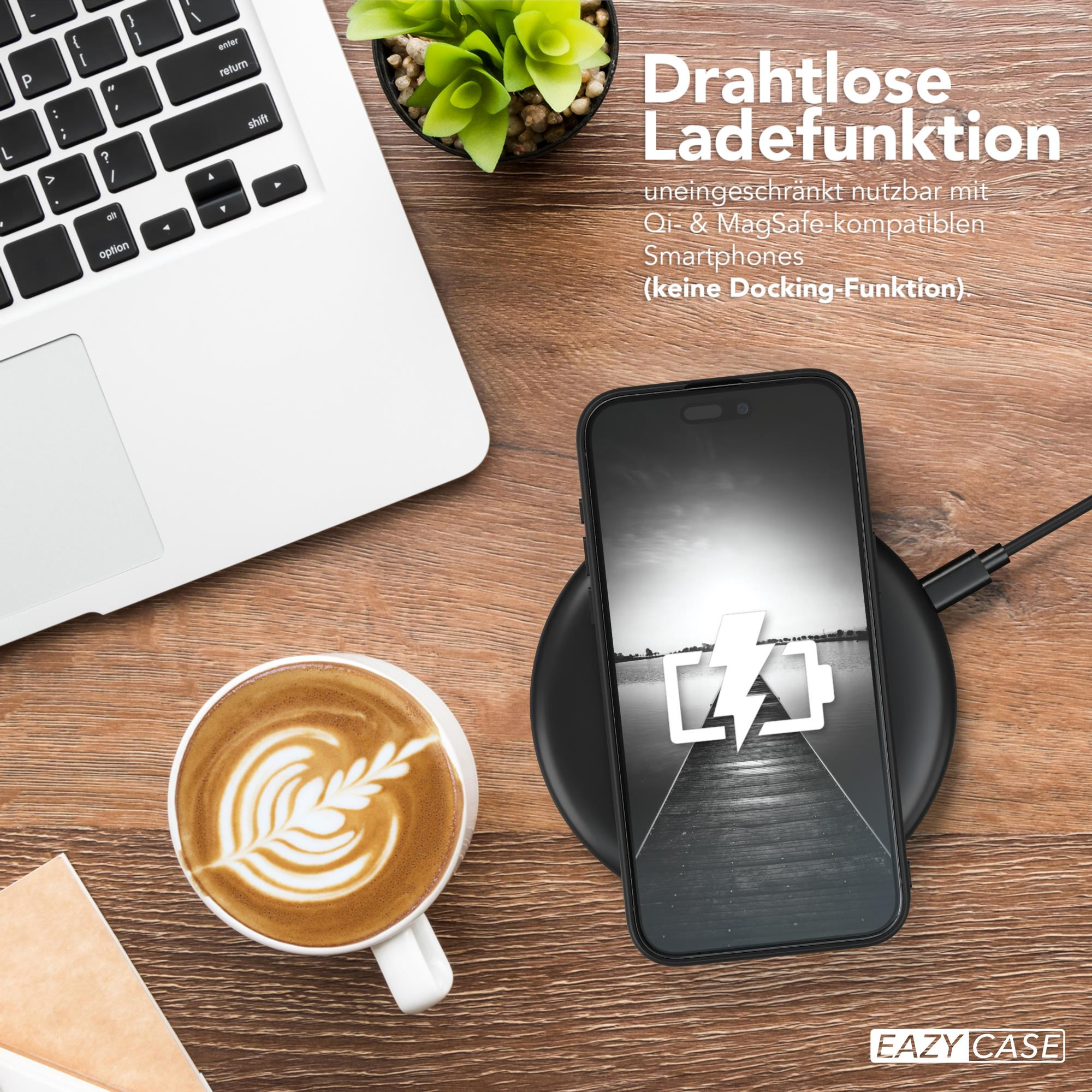 Ein Smartphone auf einem kabellosen Ladegerät, Kaffeetasse und Laptop. Das Telefon zeigt einen Blitz.