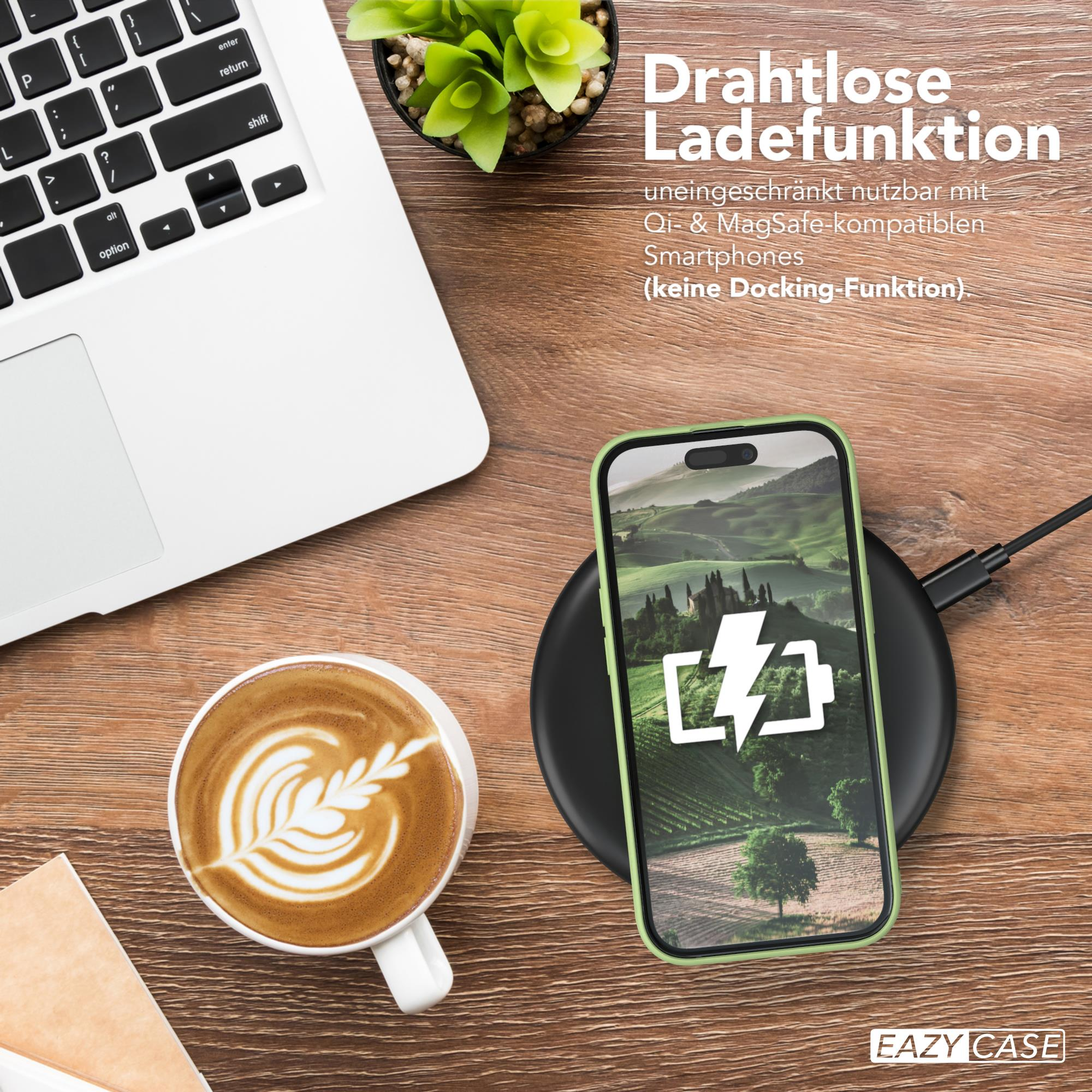 Ein Telefon wird kabellos geladen. Laptop, Kaffee und Pflanze liegen auf einem Holzschreibtisch.