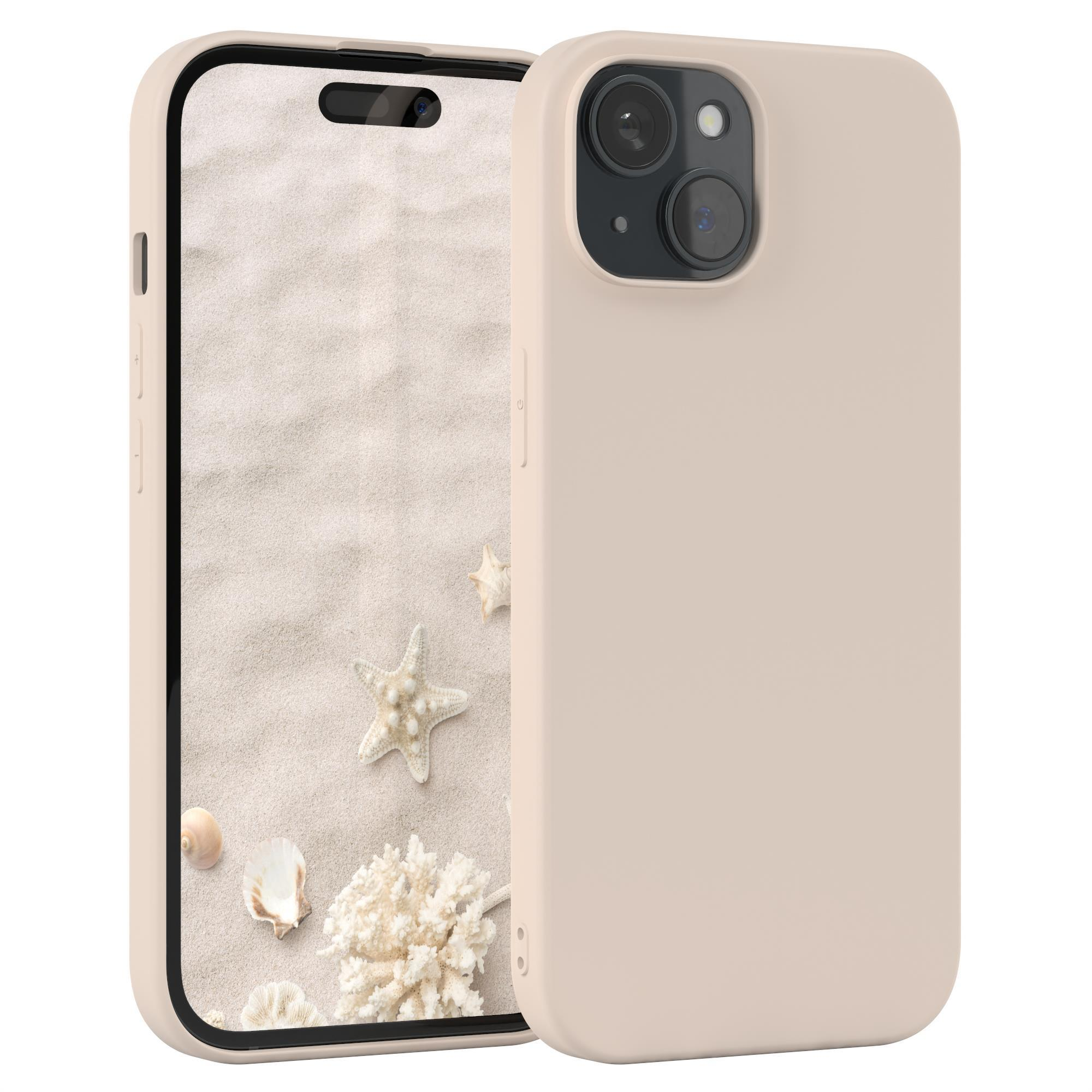 Beige Handyhülle mit Handy, Kamera und Bildschirm, vor einem Sandstrand.
