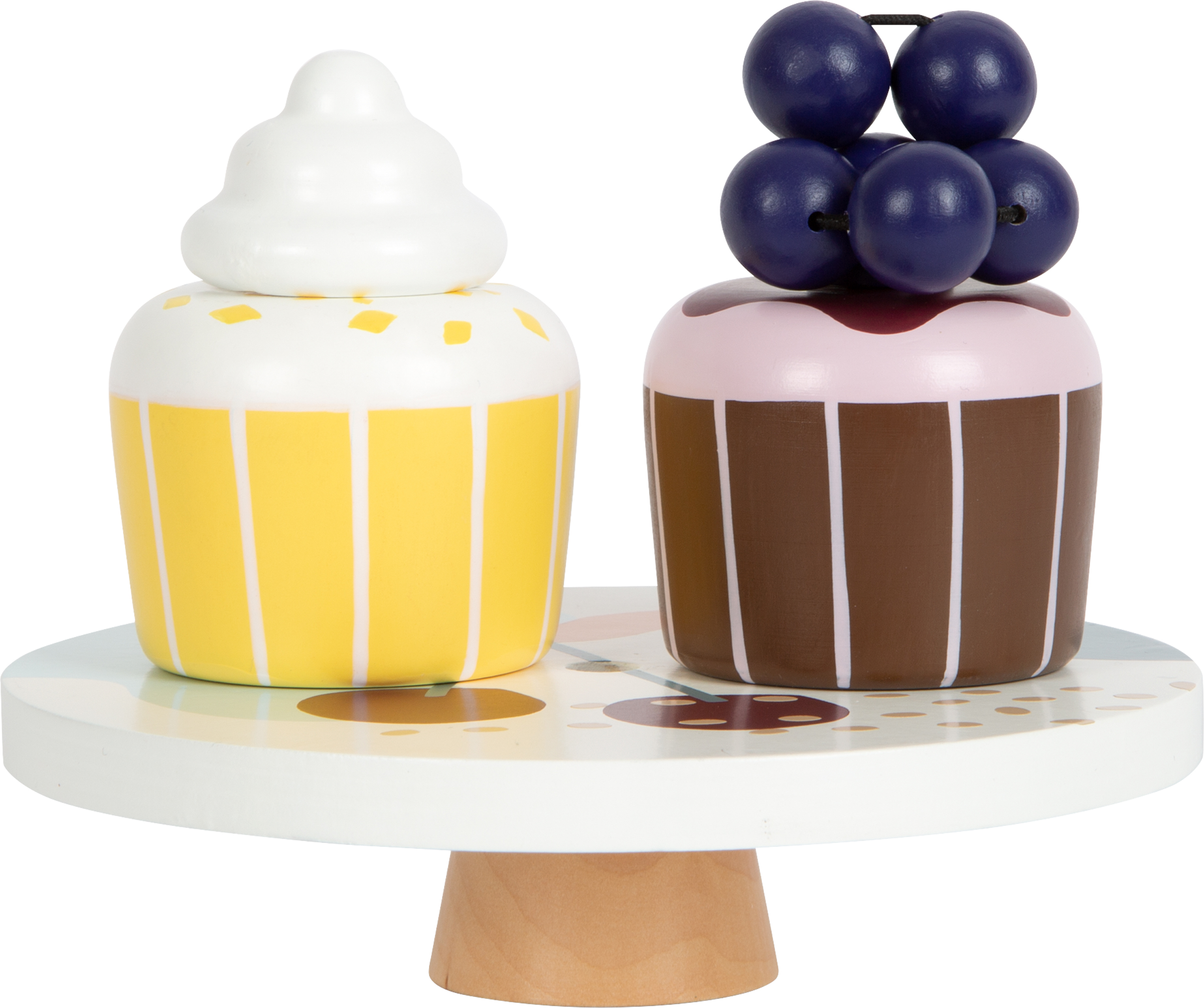 Dos cupcakes decorativos en un soporte para pasteles, uno amarillo, uno con arándanos.