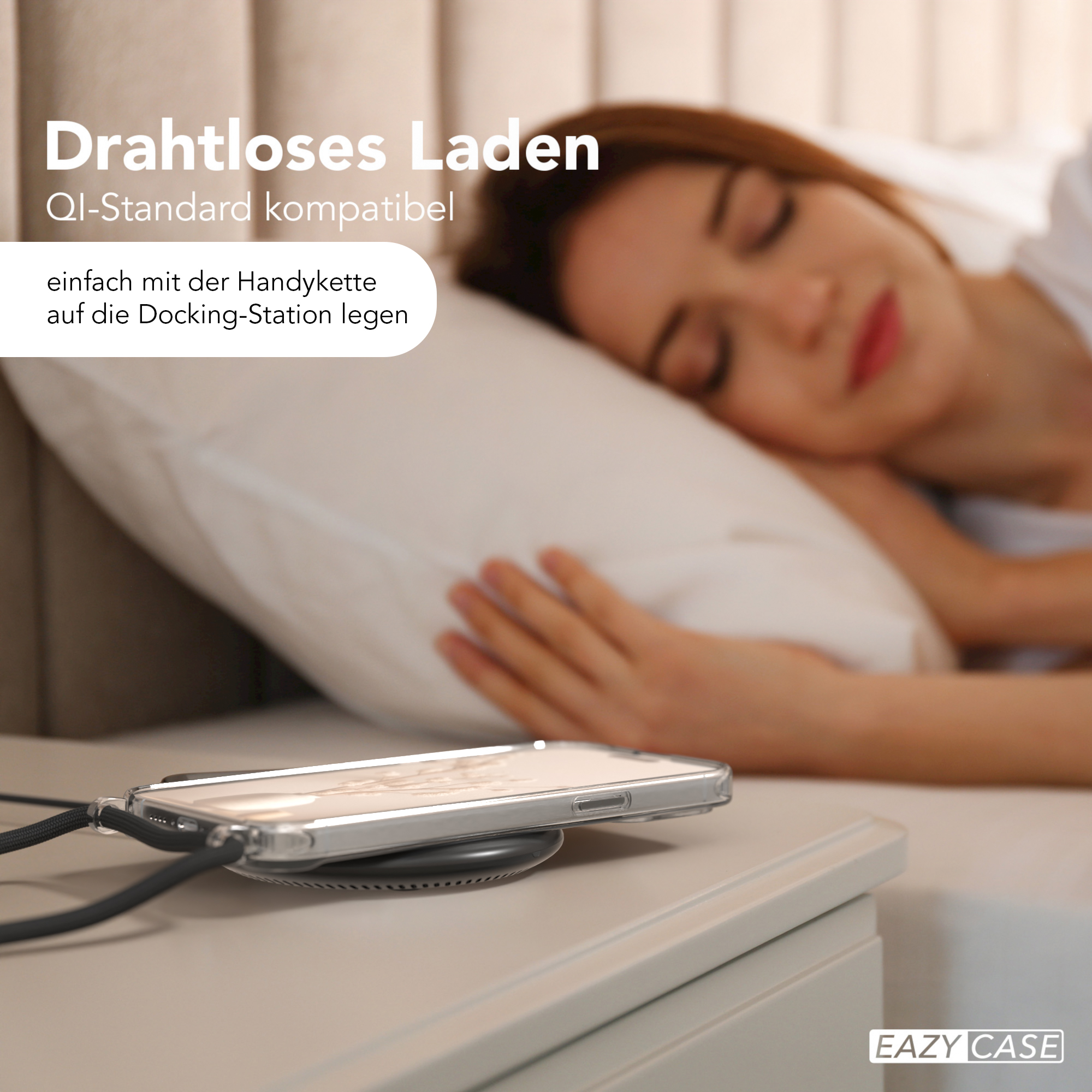 Eine schlafende Frau neben einem Nachttisch mit einem Telefon auf einem kabellosen Ladegerät.