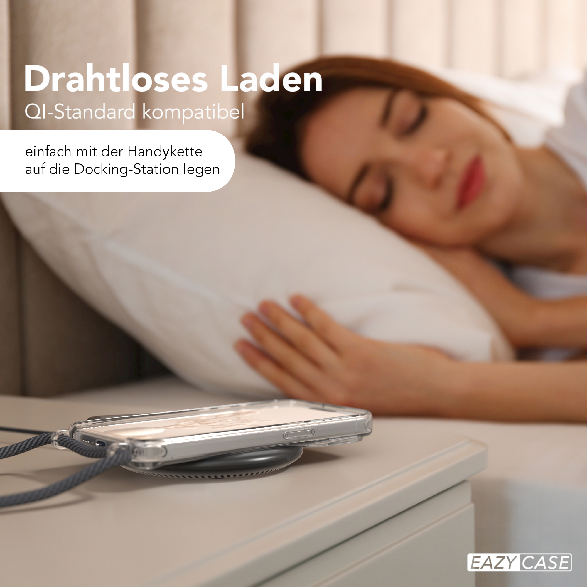 Telefon lädt auf einem Pad, im Hintergrund eine schlafende Frau. Text: 'Kabelloses Laden'.