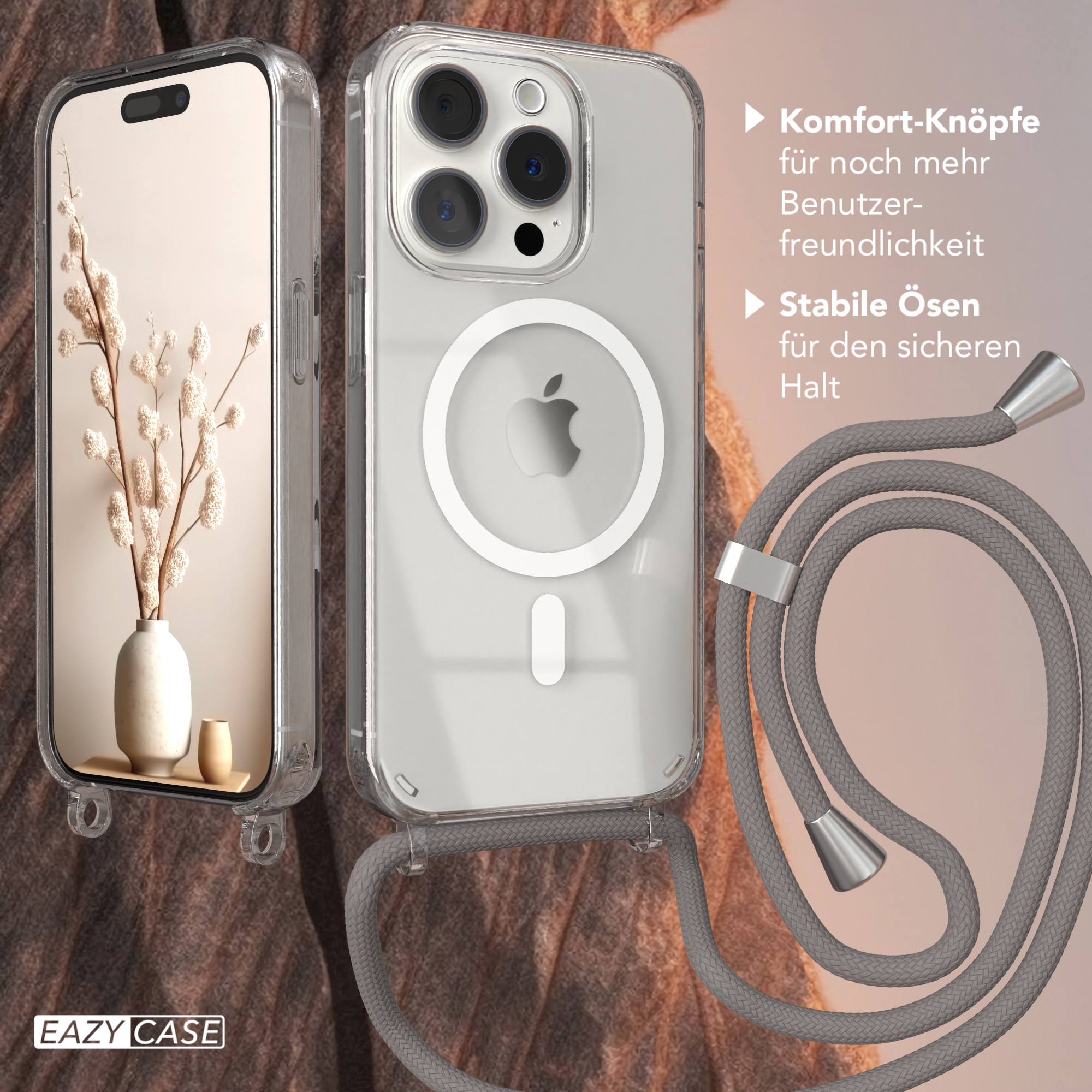 Telefon in einer Hülle mit Umhängeband, neben einer Vase.