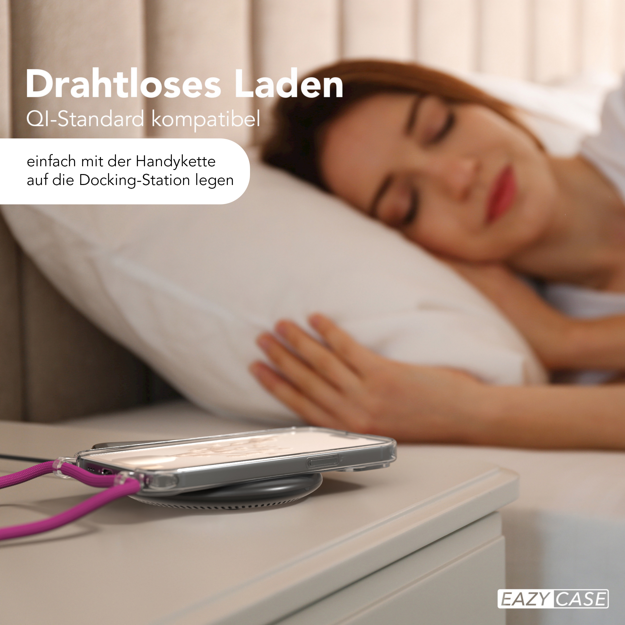 Frau schläft, Telefon wird auf einem kabellosen Ladepad geladen.