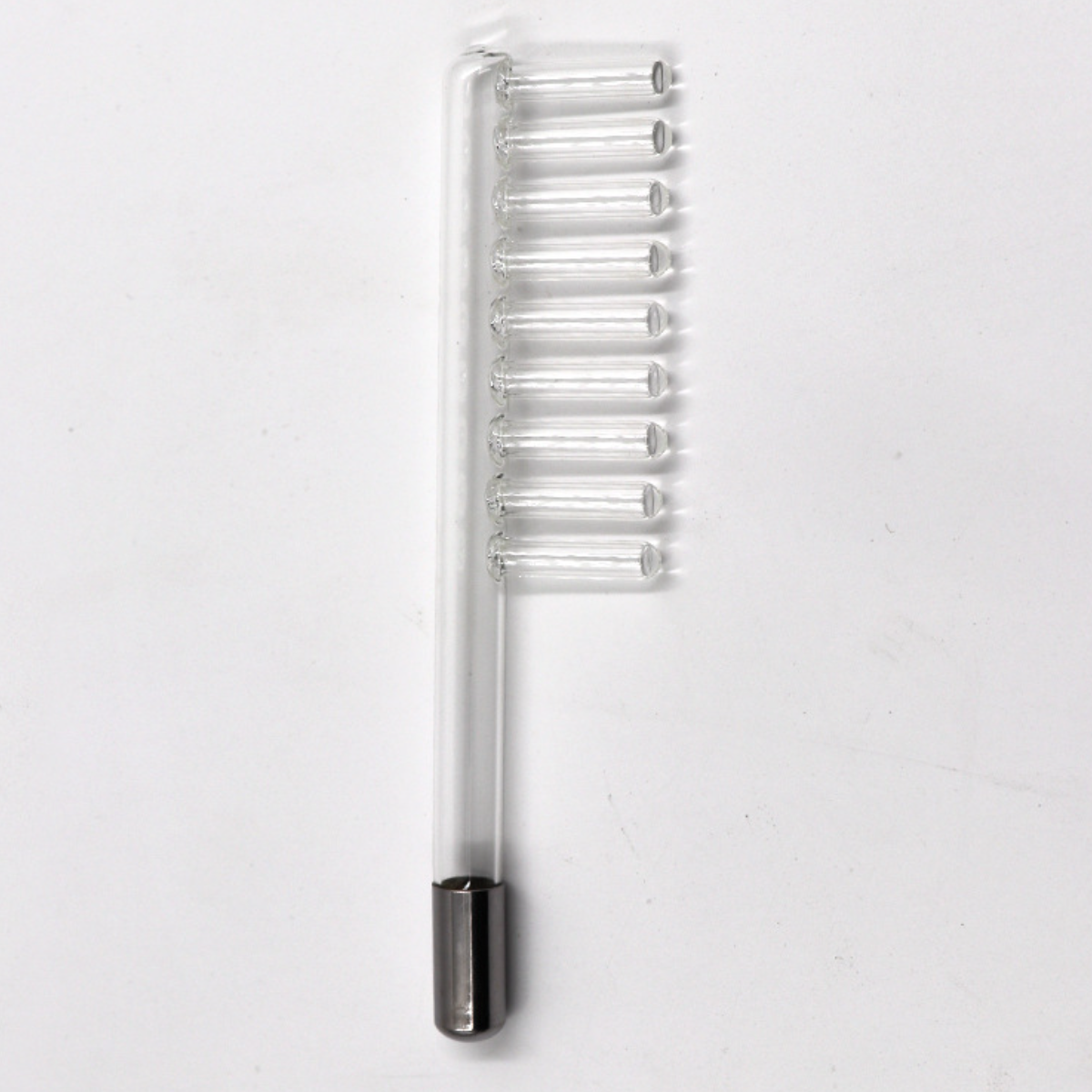 Glas-Hochfrequenzelektrode. Sie hat einen langen Stiel und 10 vertikale Stäbe oben.