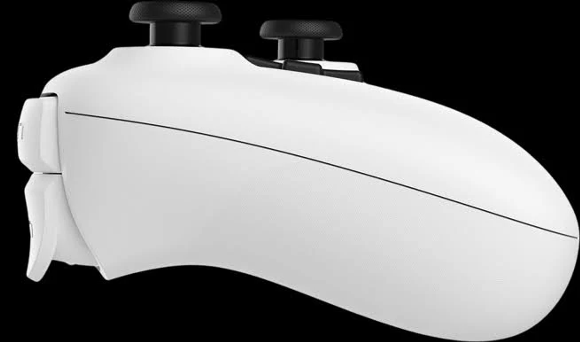 Biały kontroler do gier. Ma dwa czarne joysticki i kilka przycisków. Czarne tło.