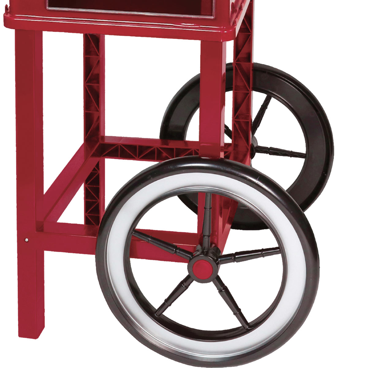 Roter Popcornwagen mit zwei schwarzen Rädern mit weißen Felgen. Der Wagen ist teilweise sichtbar.
