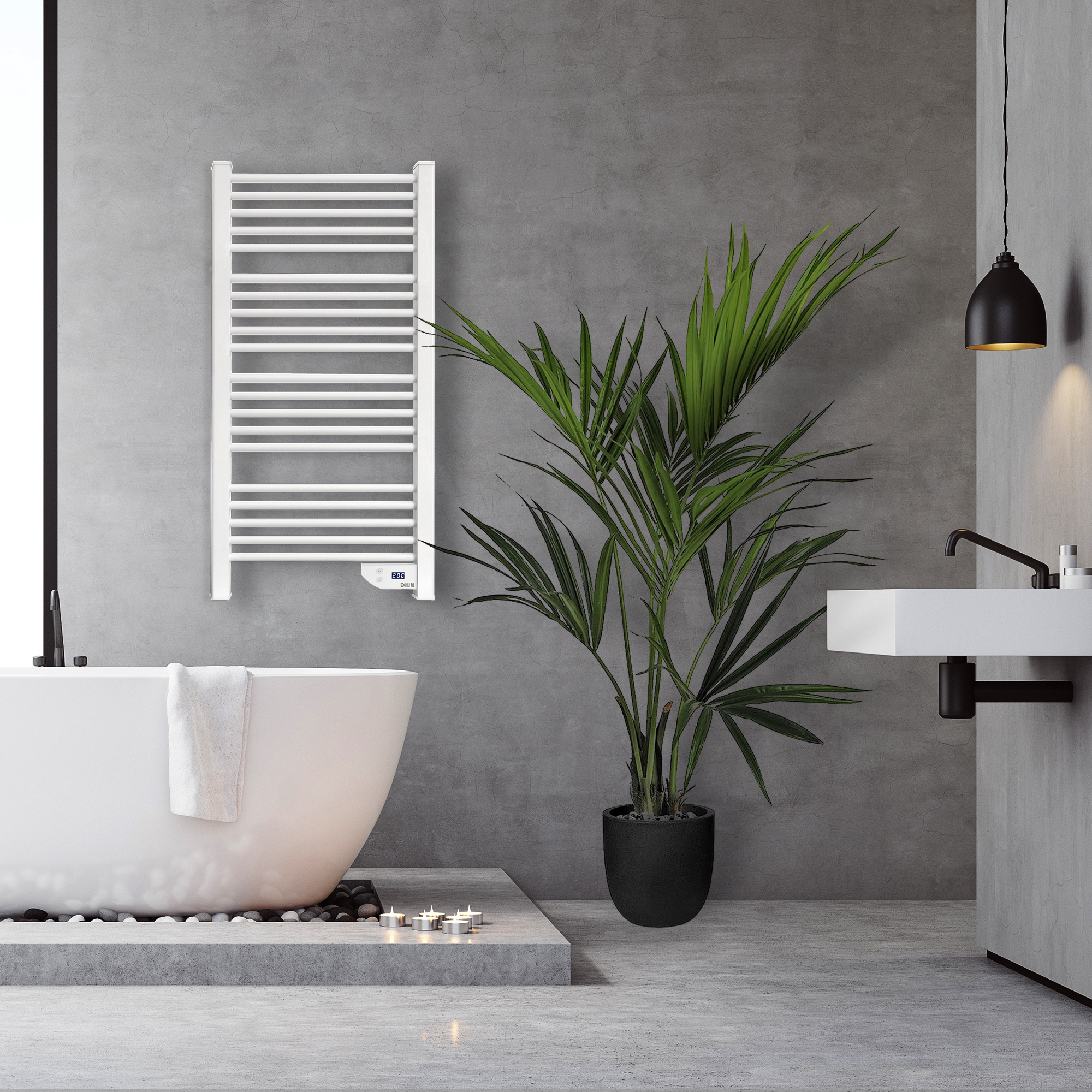 Baño moderno con bañera blanca, toalla y una planta.