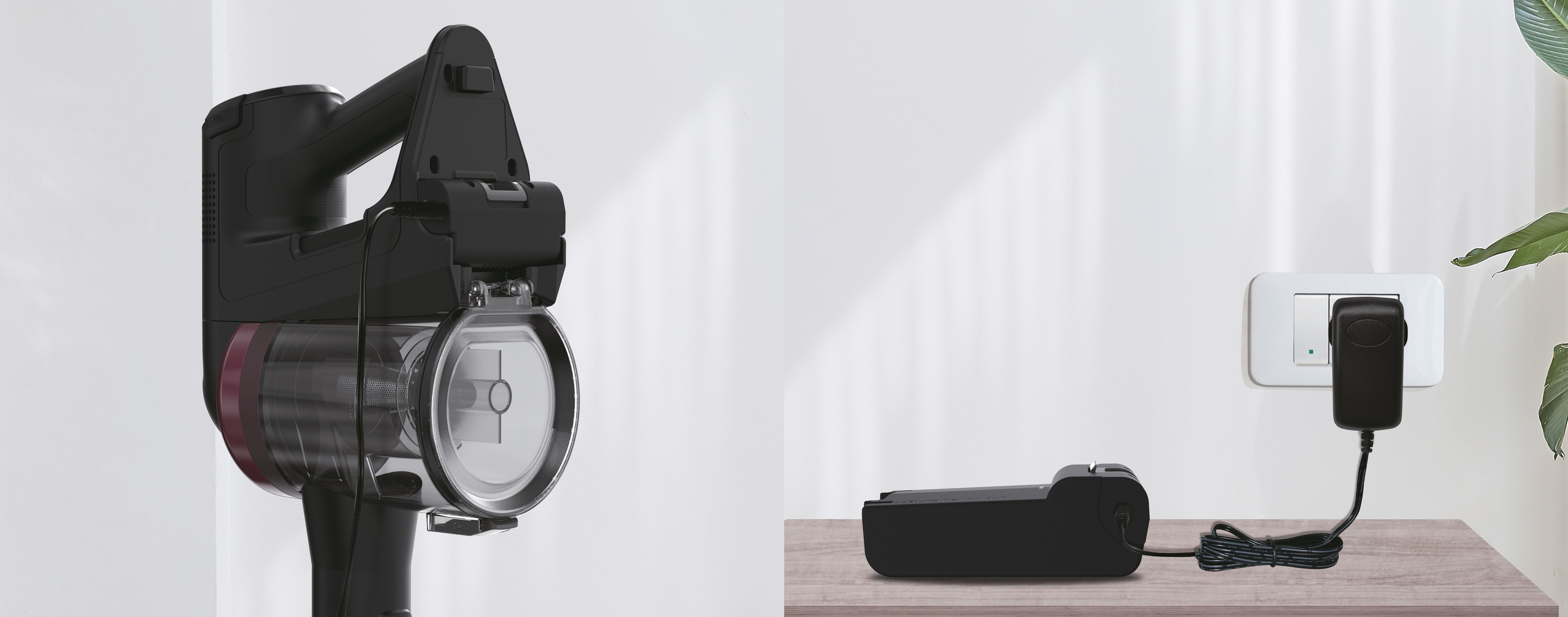 A black vacuum cleaner and its charging dock. The charging dock is plugged into a wall outlet.