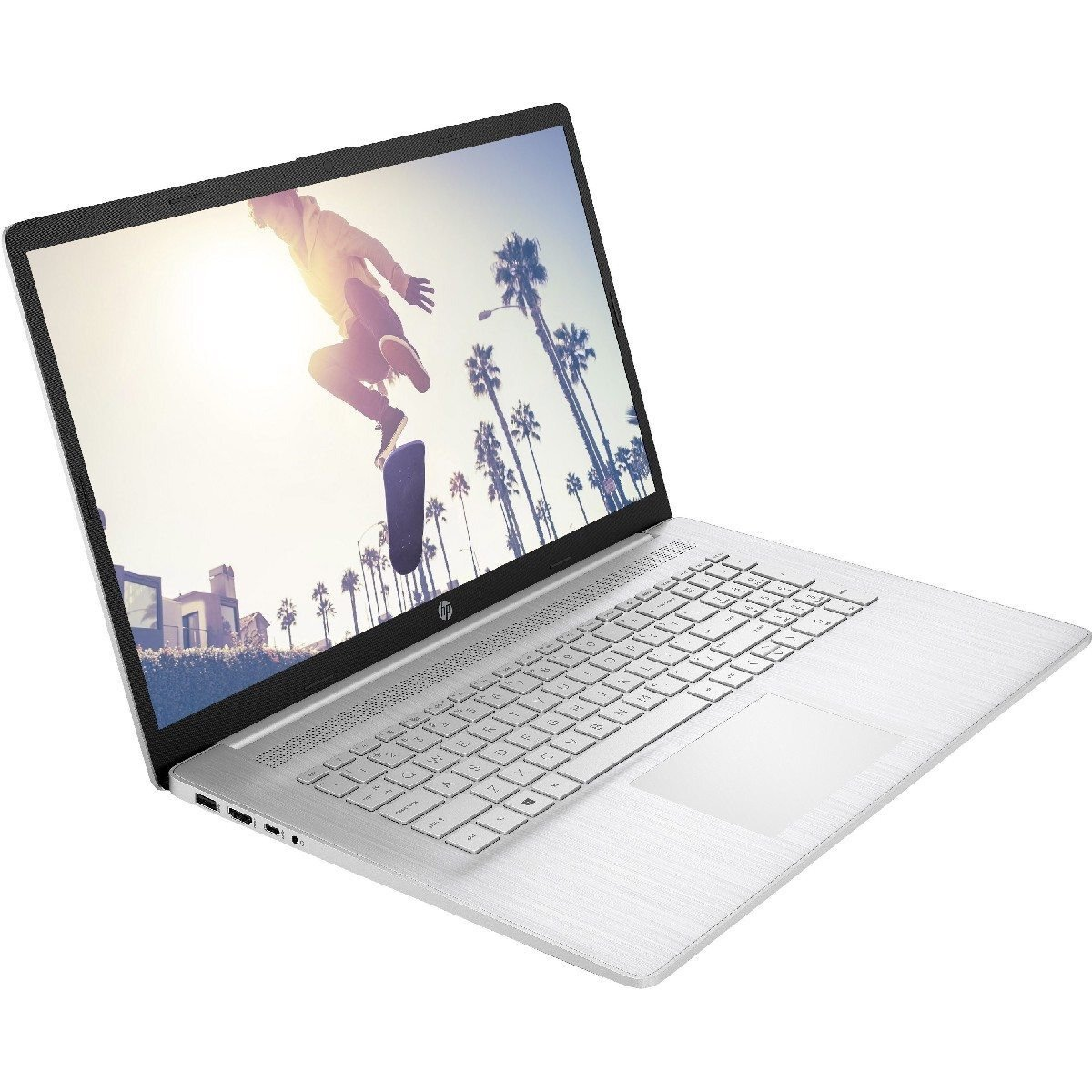 Ein silberner Laptop, der ein Bild eines Skateboarders anzeigt.
