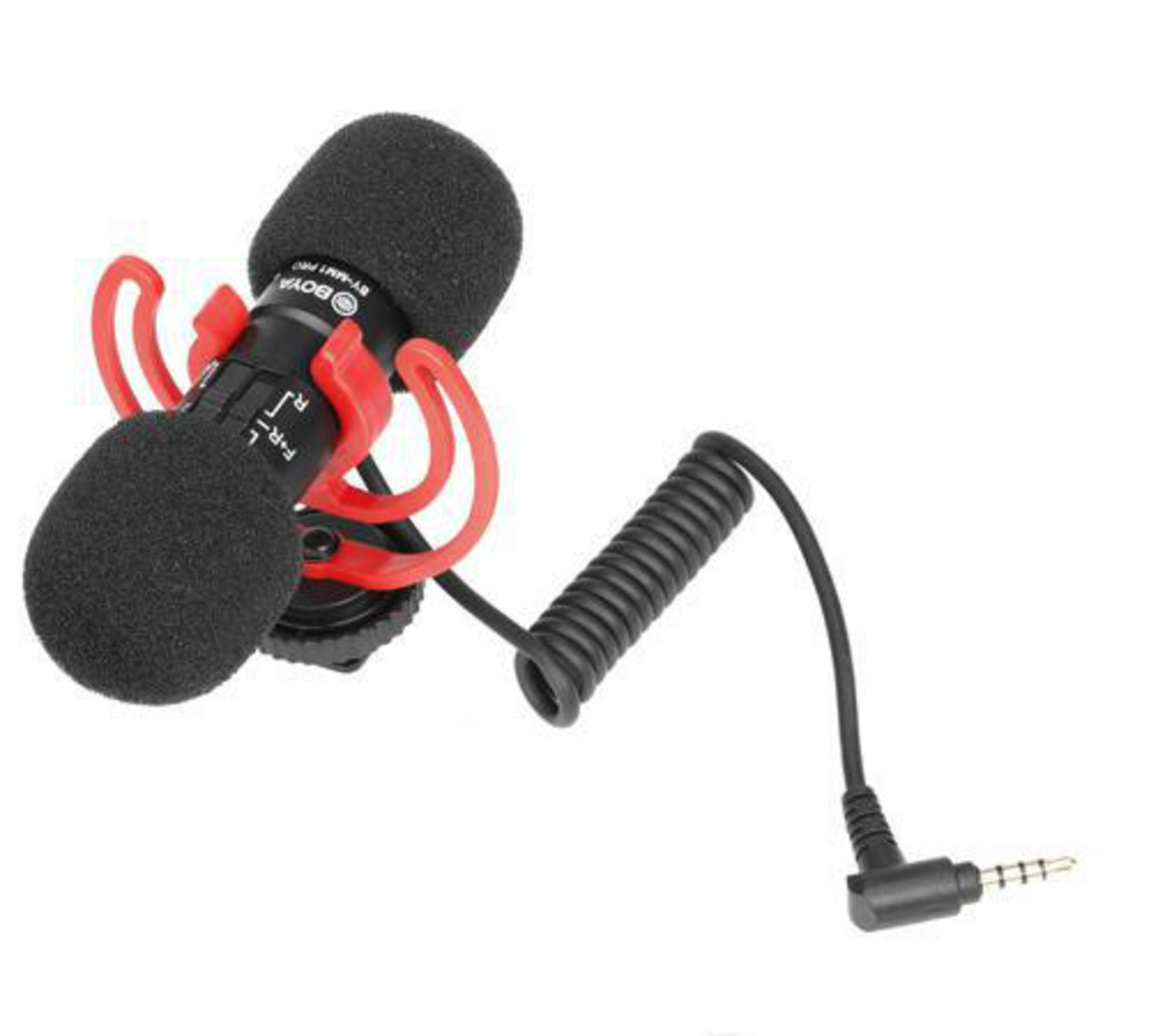 Schwarzes Mikrofon mit roter Stoßdämpferhalterung und Kabel. Das Mikrofon ist schwarz mit Gitter.