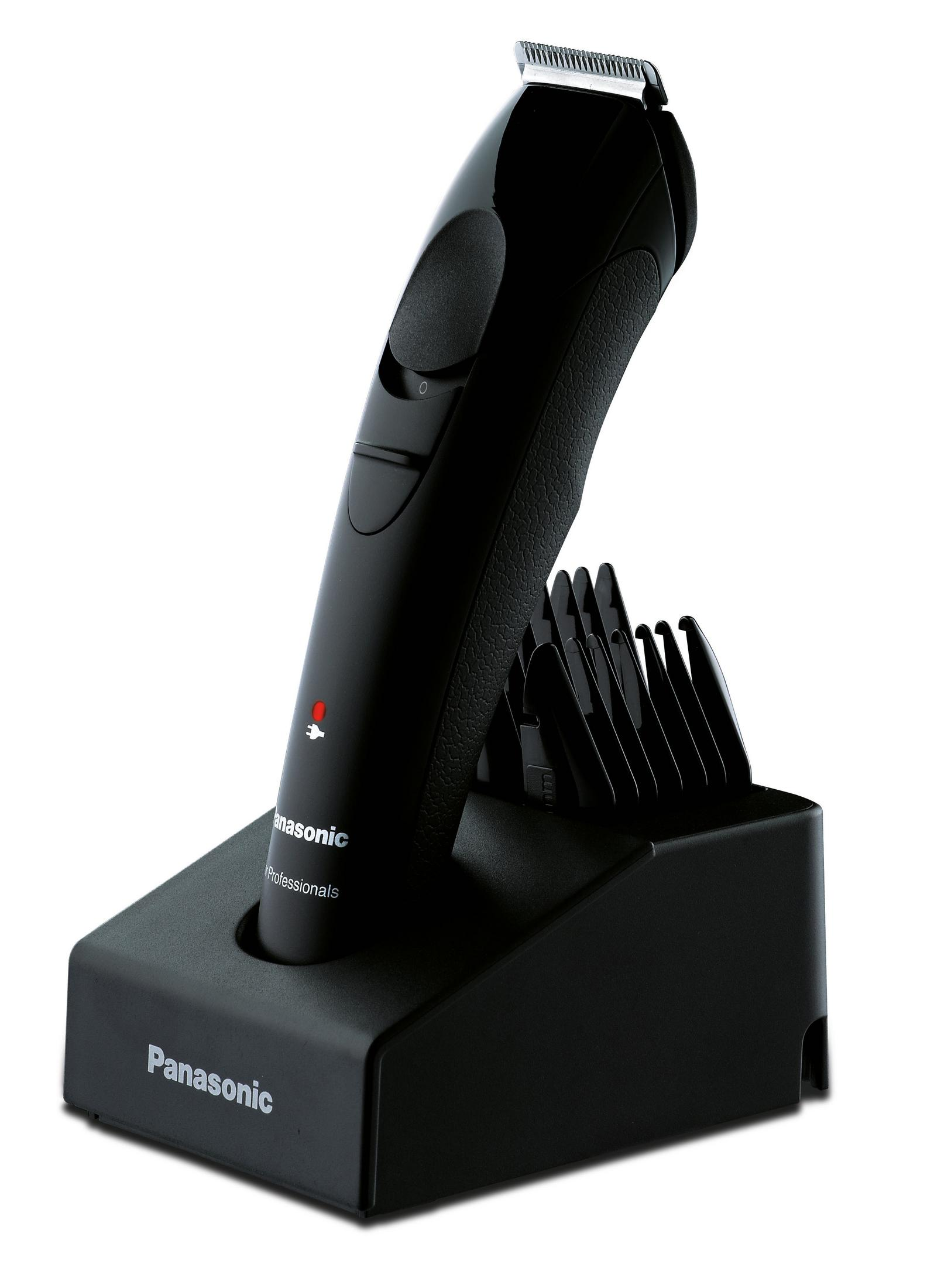 Un tagliacapelli Panasonic nero con base di ricarica e diversi accessori.