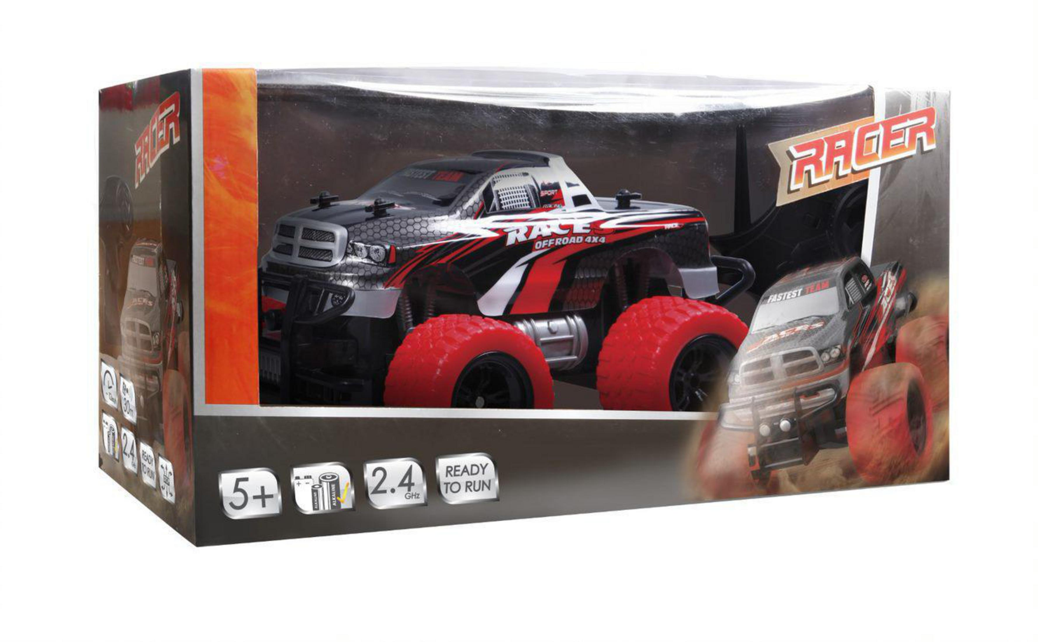 Spielzeug-Truck in einer Box. Die Box zeigt Bilder des Trucks und Texte wie "Racer" und "Ready to Run".