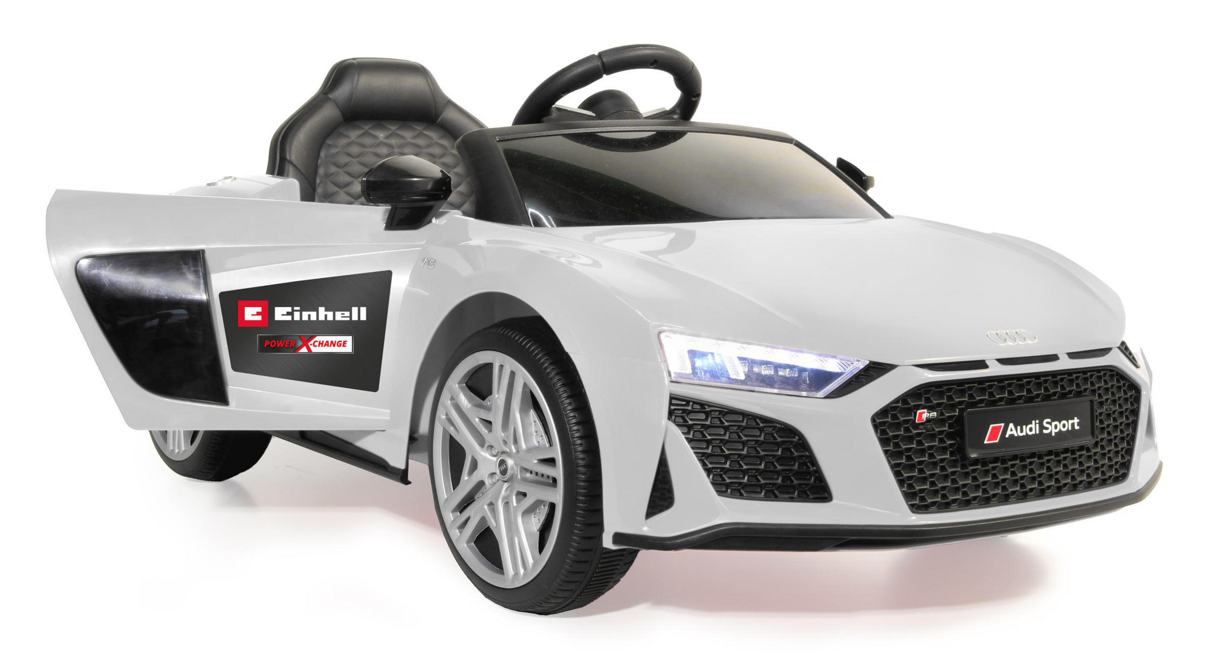 Weißes Audi R8 Spielzeugauto mit offener Tür, schwarzem Innenraum und dem Einhell-Logo an der Seite.