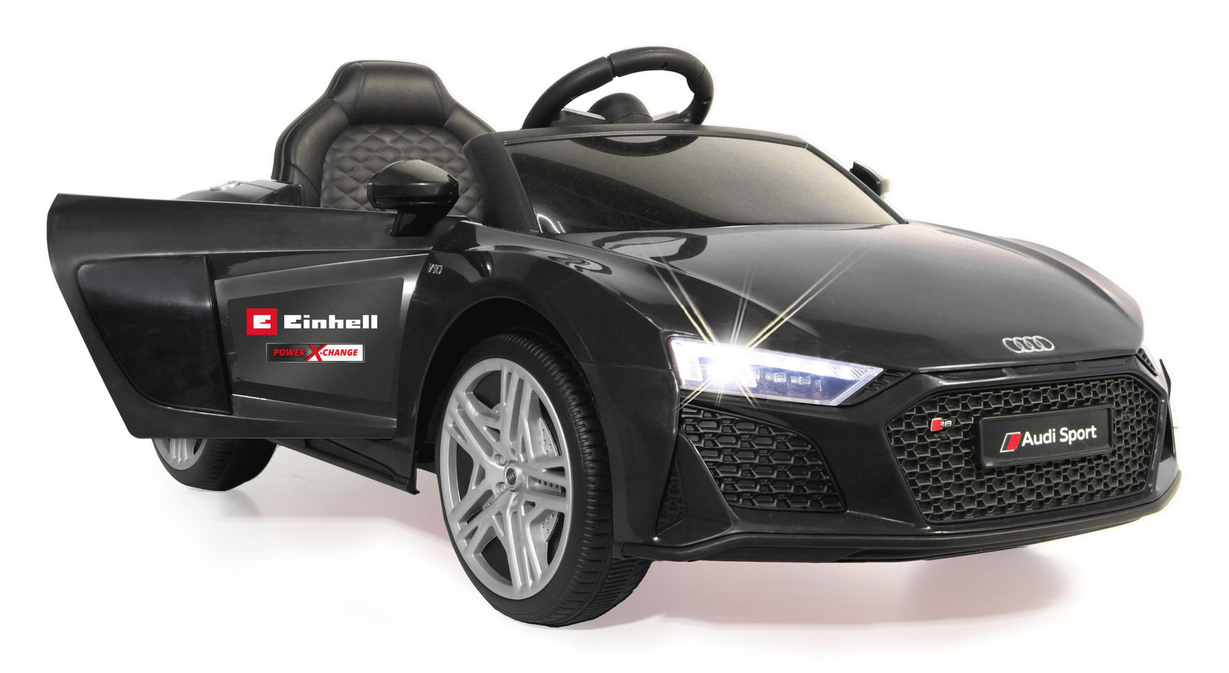 Schwarzes Audi R8 Spielzeugauto mit offener Tür. Weißer Hintergrund. Einhell- und Audi Sport-Logos sichtbar.