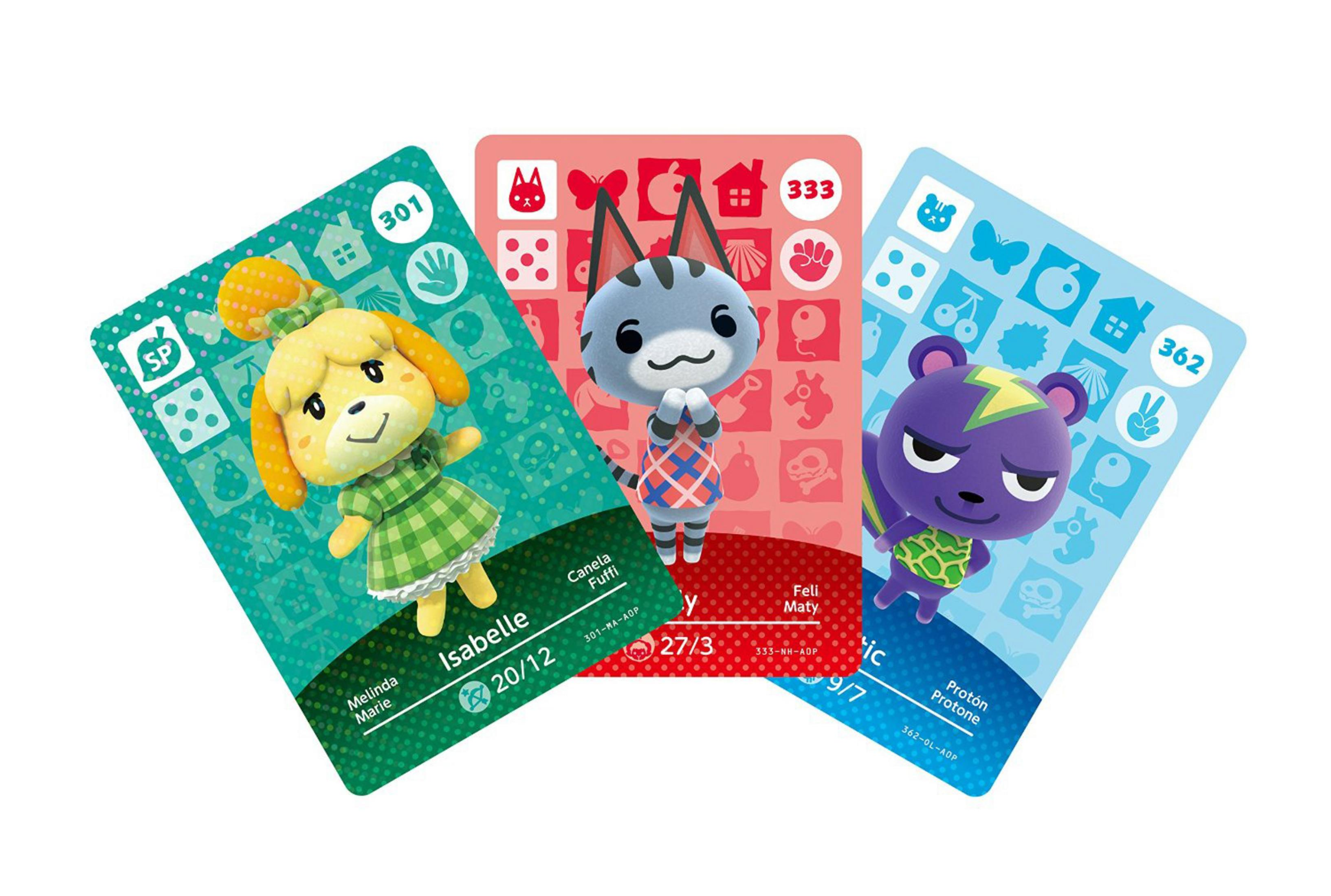 Drei Animal Crossing Amiibo-Karten: Isabelle, Katie und Static auf Weiß.