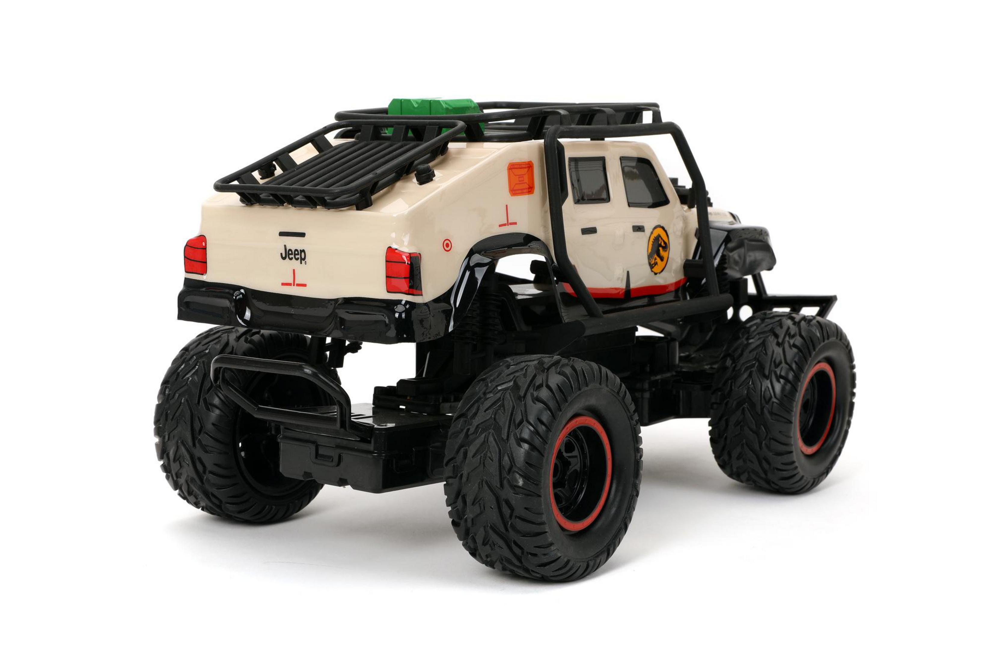 Ein beigefarbener und schwarzer Spielzeug-Jeep mit großen Reifen, vor weißem Hintergrund.